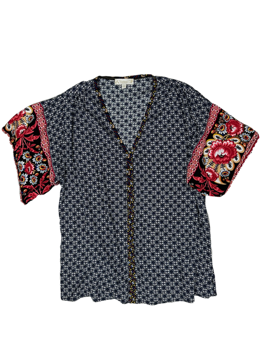 Weekend by Suzanne Betro Printed Short Sleeve Blouse Freshen up your look with this weekend-ready top from Suzanne Betro! Its light rayon fabric and playful print will be sure to make a statement. And don’t forget the