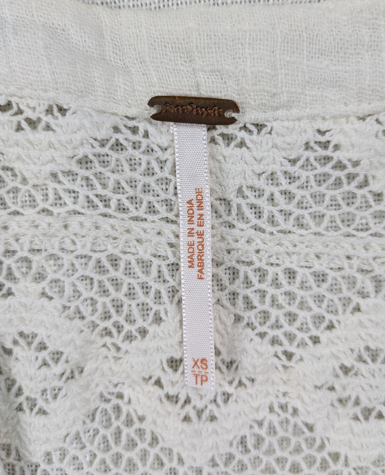 Free People Carry Me Away Crop Top Size XS Get lost in the free-spirited charm of the Free People Carry Me Away Crop Top. Crafted with delicate crochet lace and embr