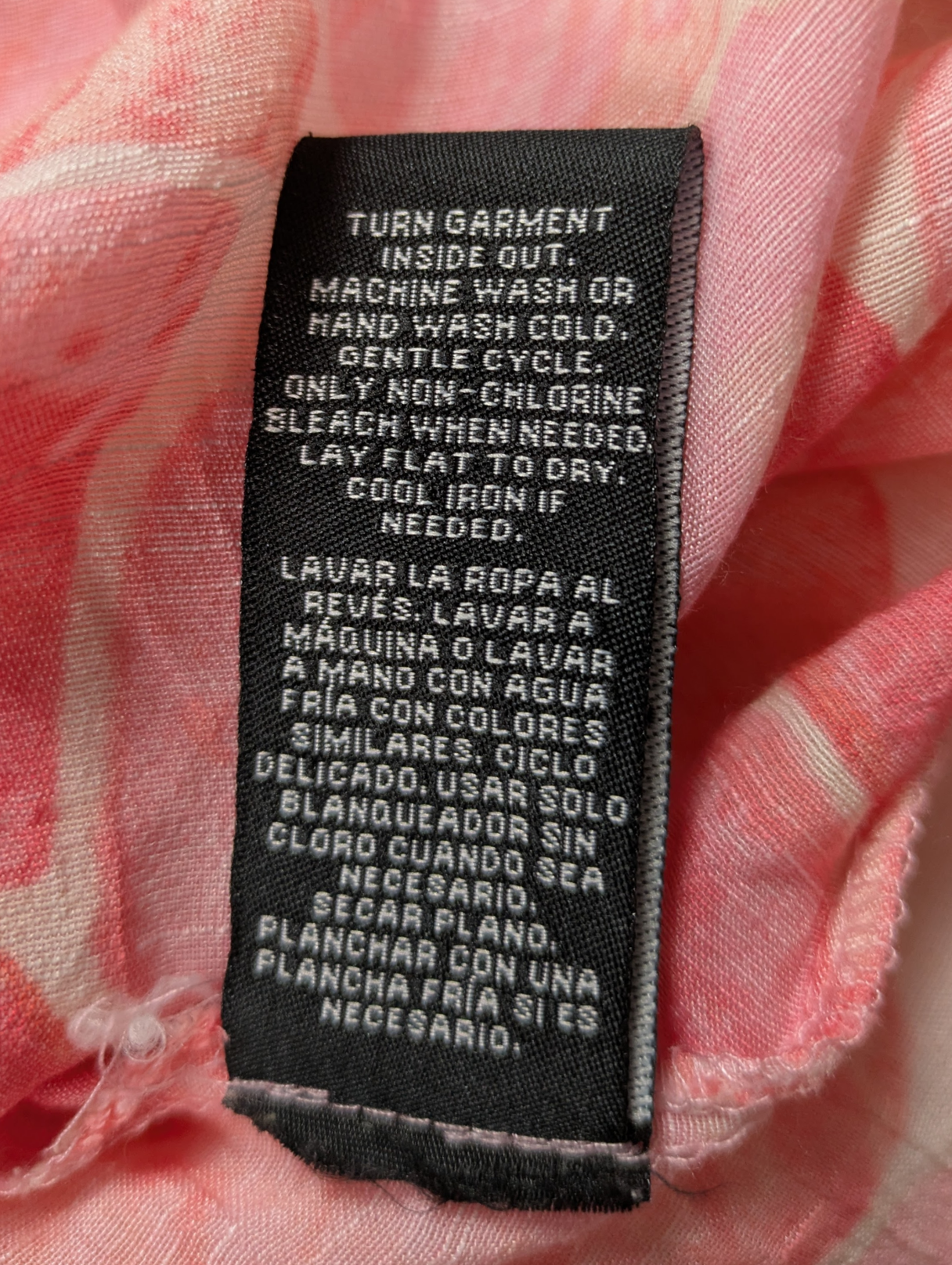 Zac & Rachel Pink Print Long Sleeve Blouse Size XL This Zac & Rachel blouse is a playful addition to your wardrobe. With a V neck, button-up front, and roll tab slee