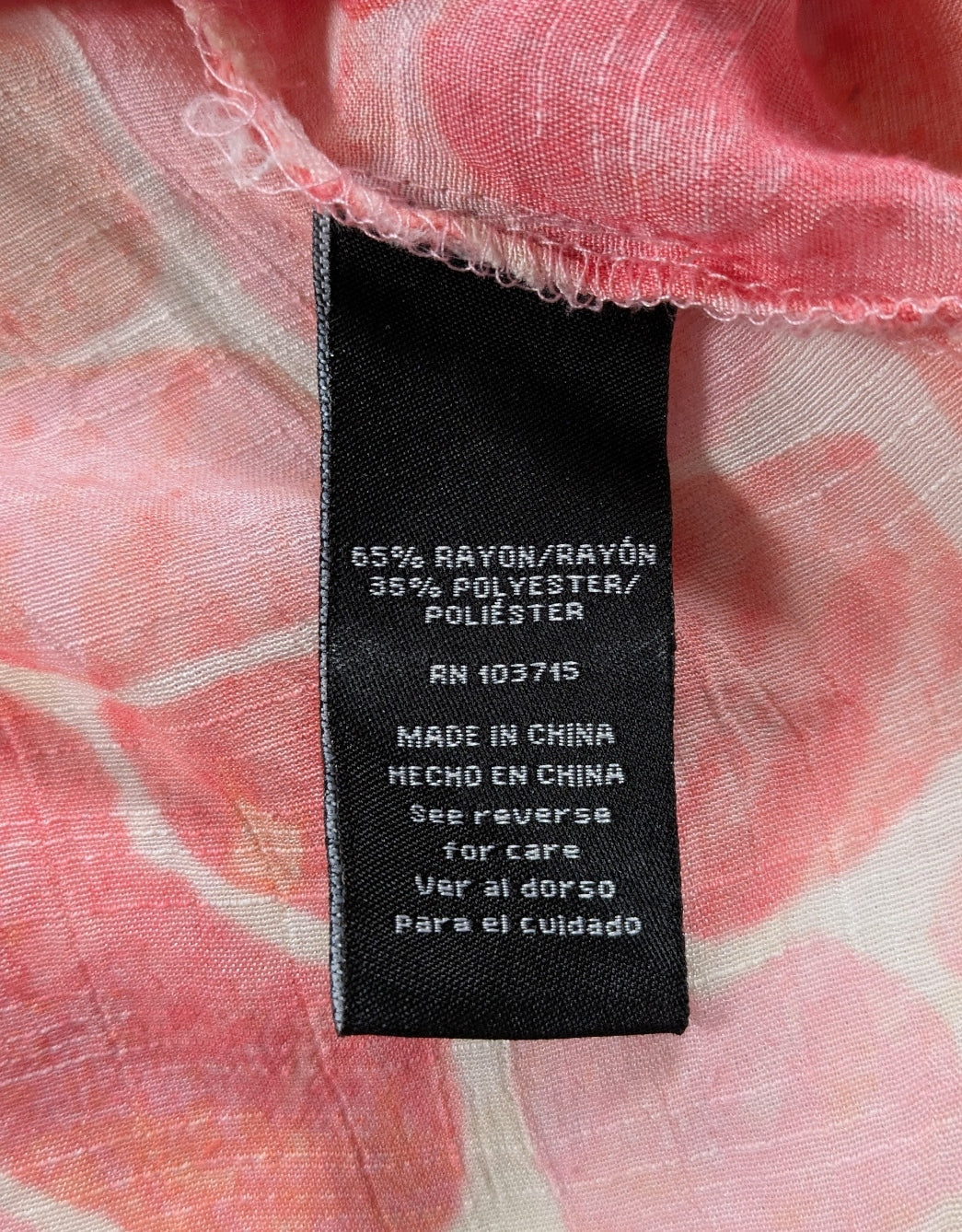 Zac & Rachel Pink Print Long Sleeve Blouse Size XL This Zac & Rachel blouse is a playful addition to your wardrobe. With a V neck, button-up front, and roll tab slee