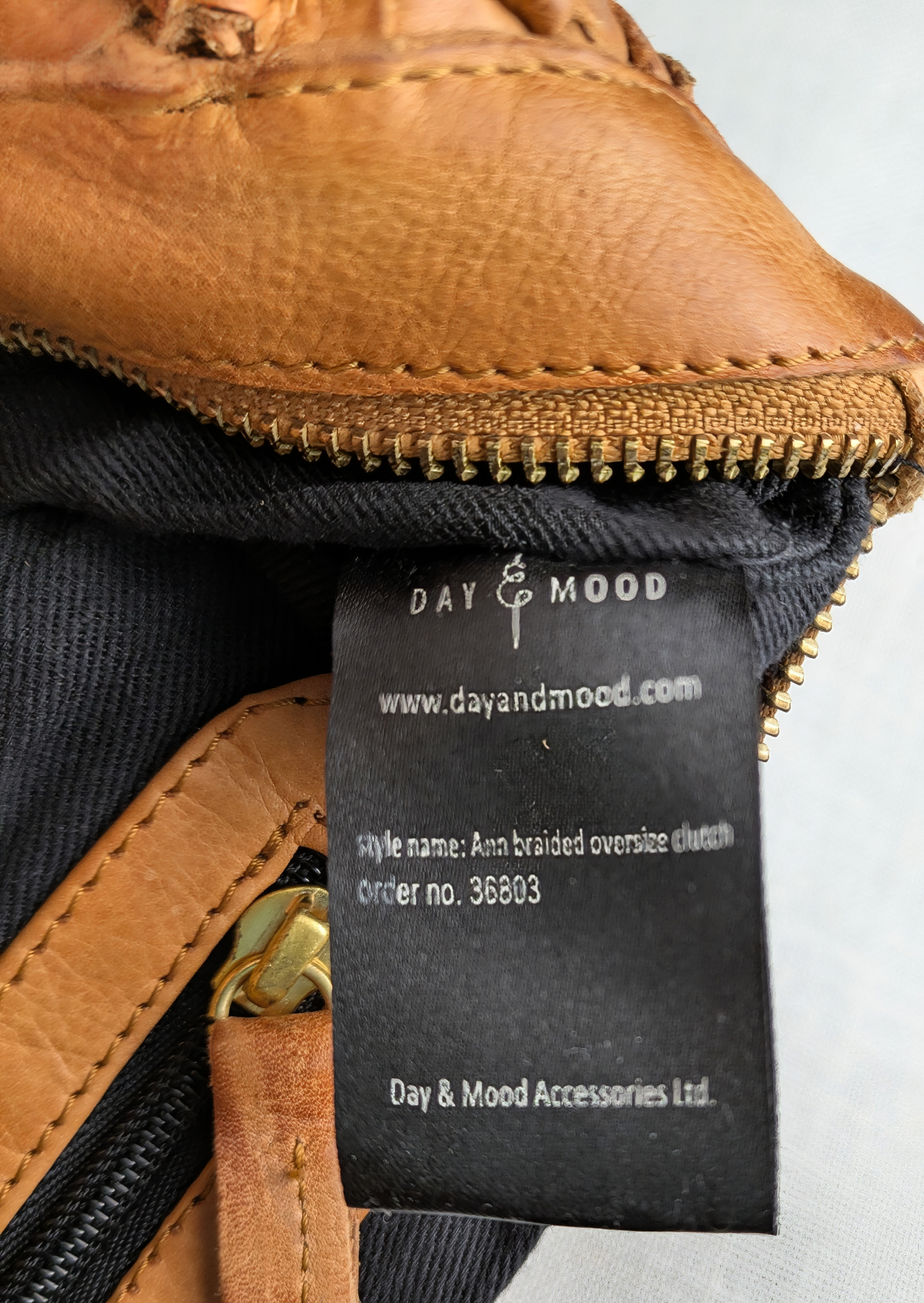 Anthropologie Day & Mood Ann Braided Oversized Clutch Indulge in luxury with the Anthropologie Day &amp; Mood Ann Braided Oversized Clutch. Crafted from soft leather