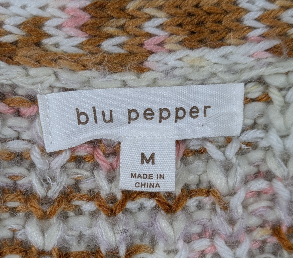 blu pepper Chunky Cardigan Sweater Stay warm and on-trend with the blu pepper Chunky Cardigan Sweater. Its button-up design and cropped, baggy fit make for a cozy an