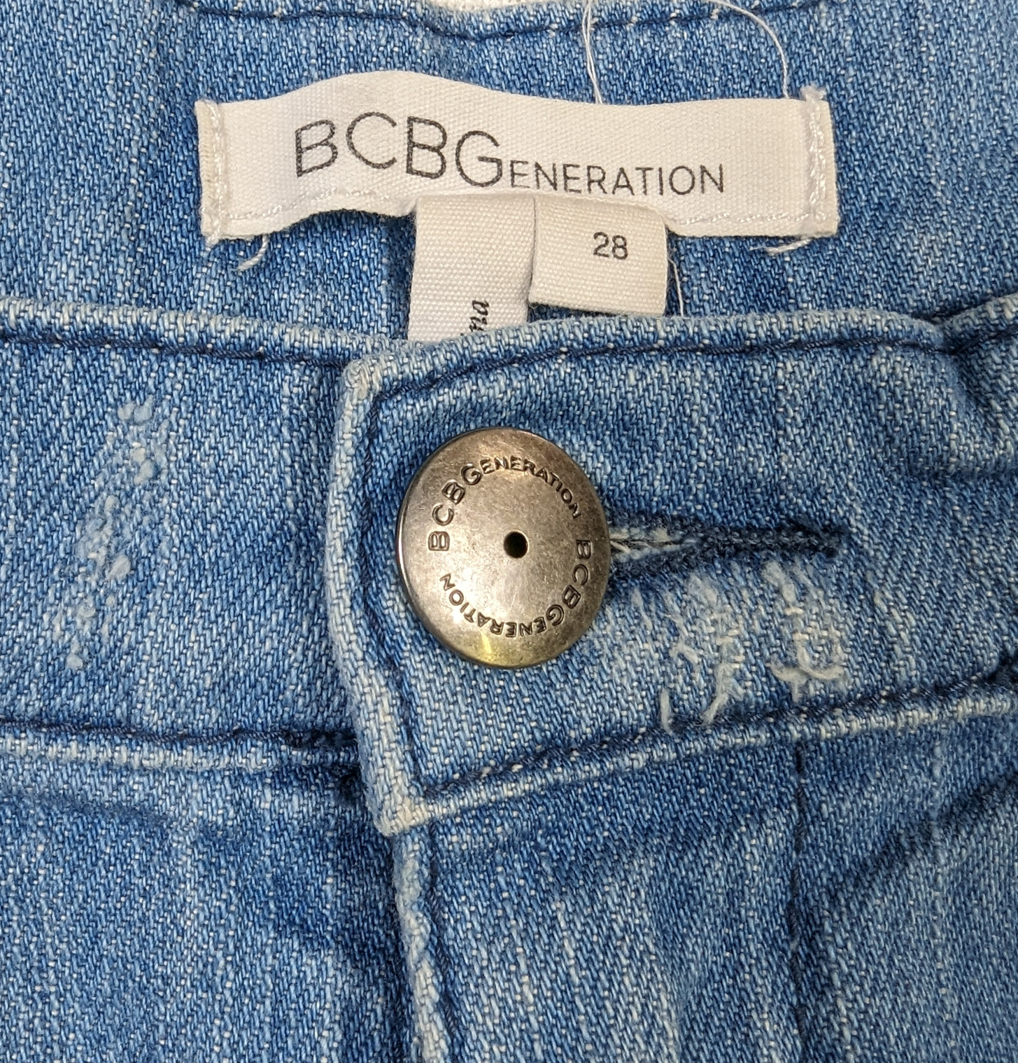 BCBGeneration Distressed Denim Shorts Size 28 Experience the perfect blend of comfort and style with BCBGeneration distressed denim shorts in size 28. Featuring side