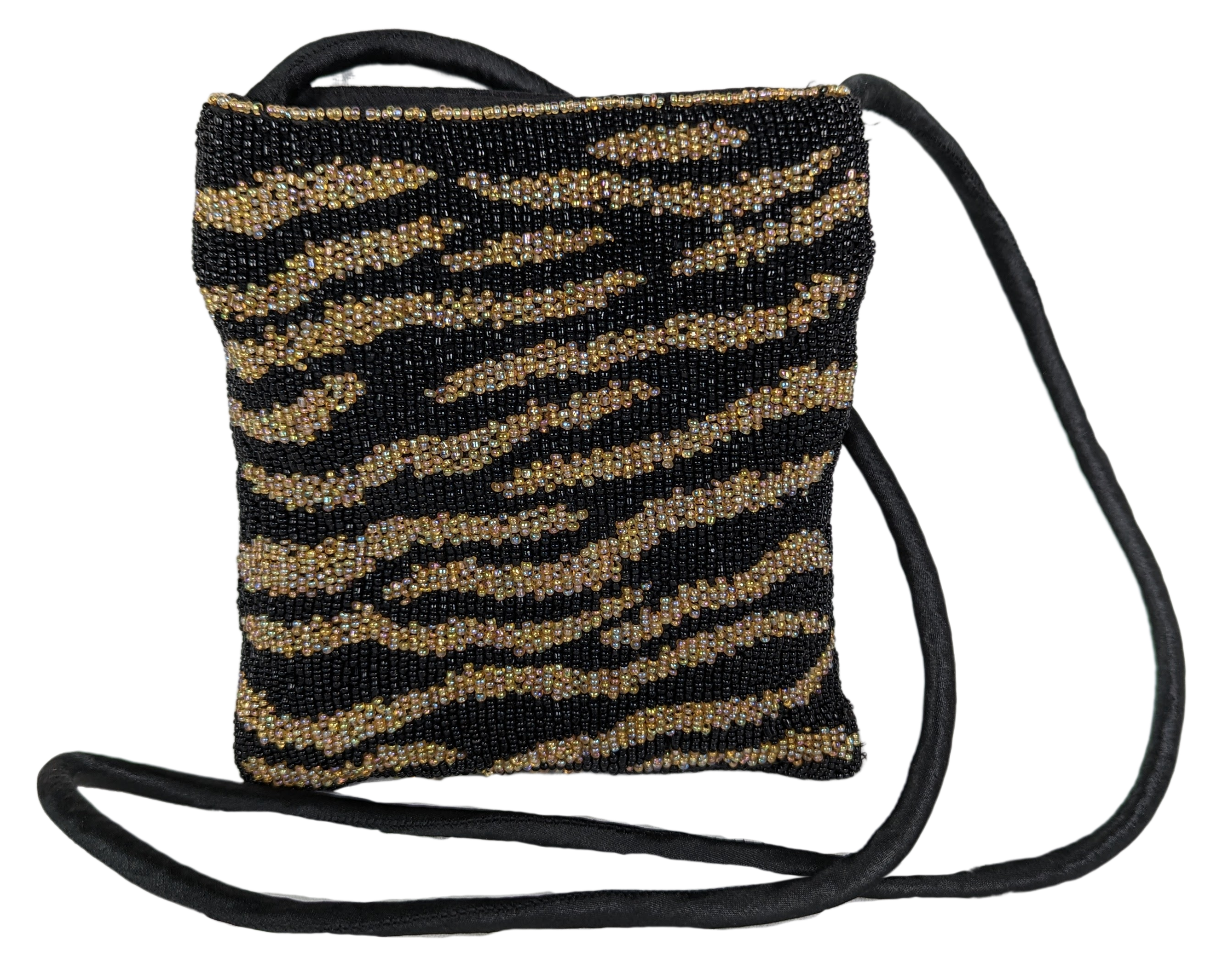 Beaded Zebra Handbag with Long Strap - Unbranded Measures:   L - 6 1/2"   W - 1/2"   H - 7"  Strap - 42"HandbagBeaded Zebra HandbagBeaded Zebra Handbag