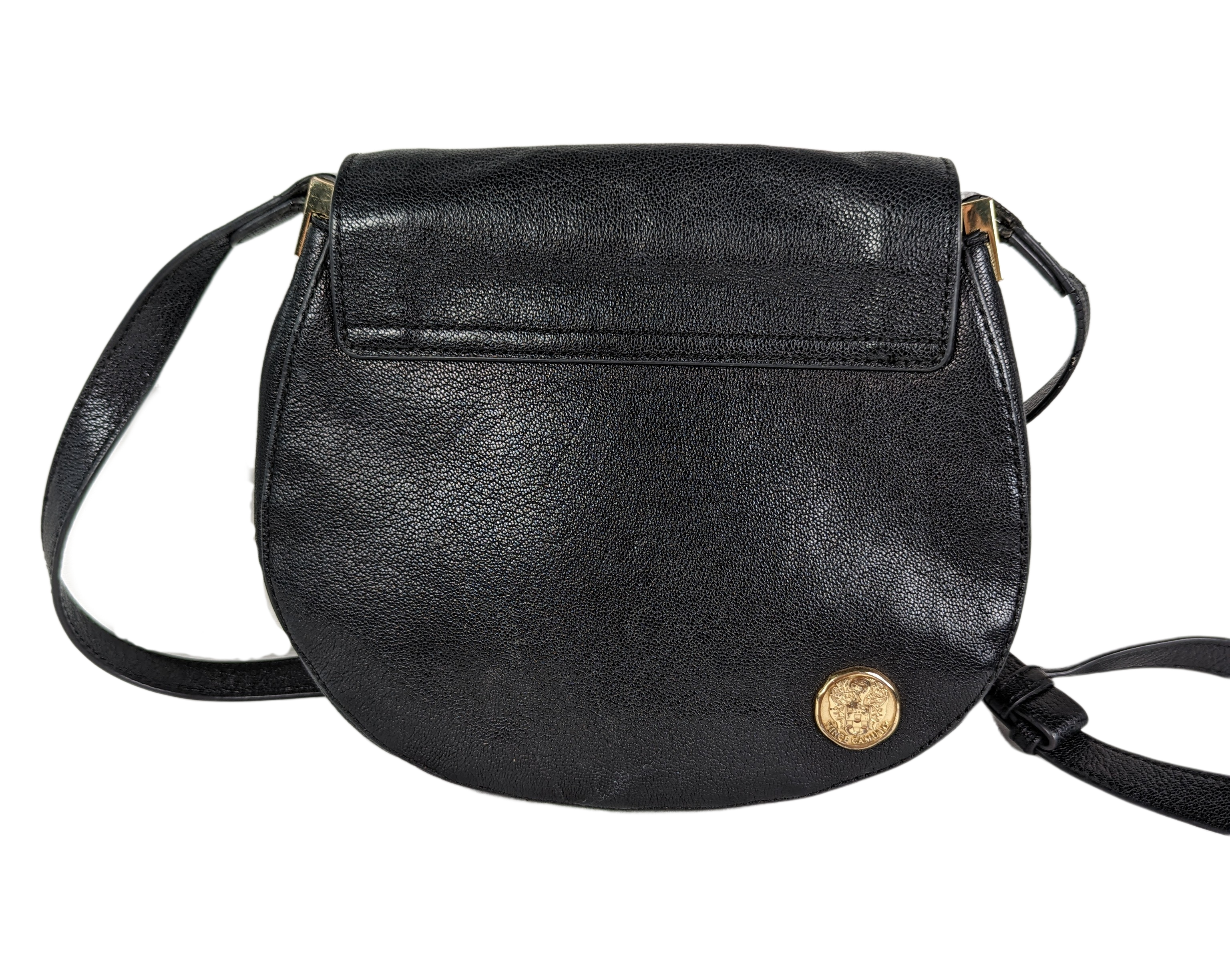 Vince Camuto Black Leather Crossbody Great crossbody with lots of pockets, a flap closure and a nice long strap.Measurements:  L - 9"  W - 3"  H - 8"  Strap - 46"+HandbagVince Camuto Black Leather CrossbodyVince Camuto Black Leather Crossbody