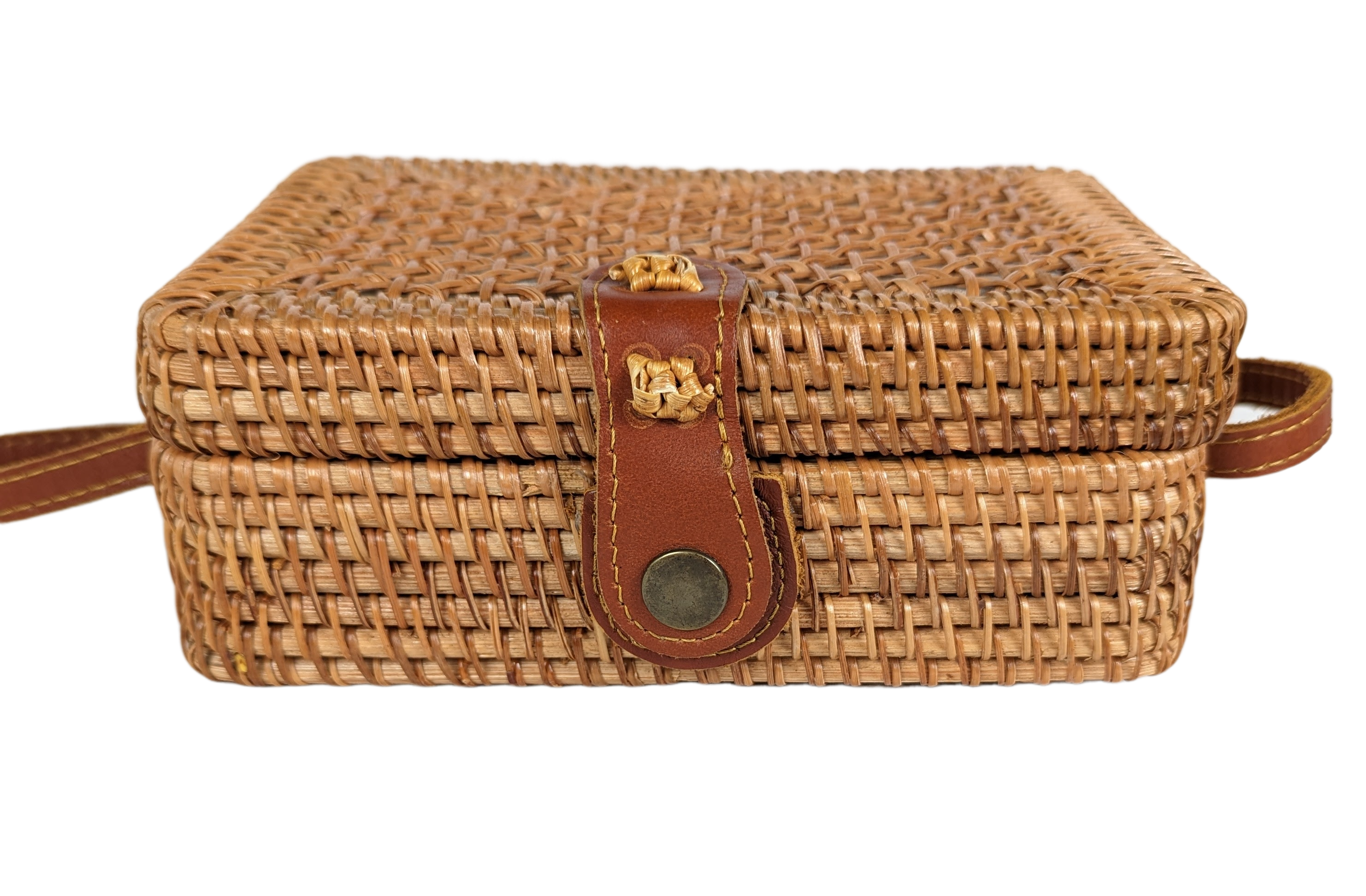  Rectangular Wicker Handbag with Leather Strap and Closure Perfect for summertime, this little purse is ideal for a day shopping or out to brunch.  Measurements:  L - 7 1/2"   W - 3"    H - 5"   Strap - 50"HandbagWicker Rectangular Purse with Leather Strap and ClosureWicker Rectangular Purse