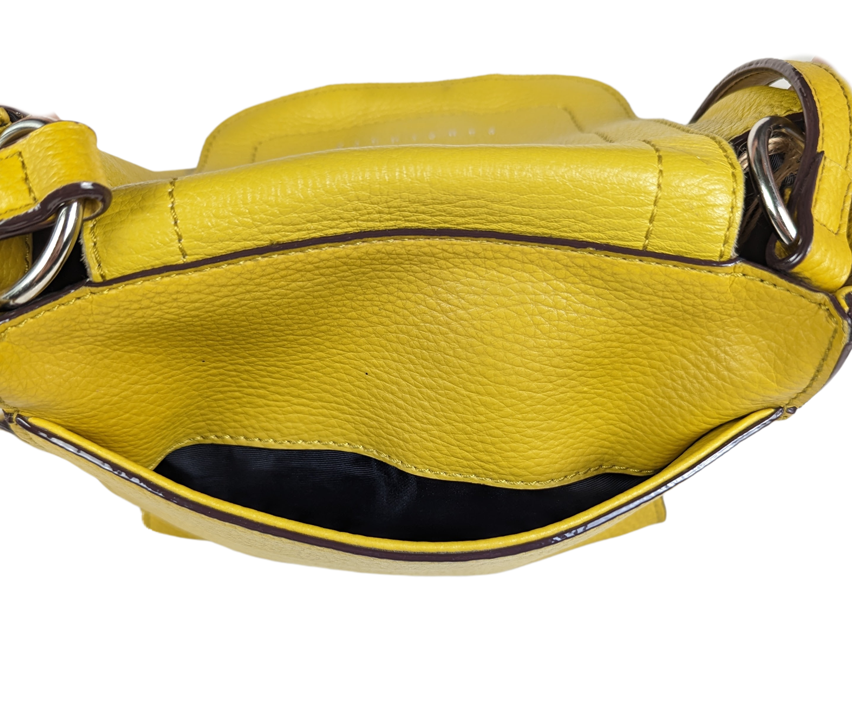 Sanctuary Yellow Leather Bucket Purse - Anthropology with adjustable strap.  Magnetic snap closure with tassel detail. Back pocket and lined interior with pockets. Minor diPurse, handbagSanctuary Yellow Leather Bucket Purse - AnthropoloySanctuary Yellow Leather Bucket Purse - Anthropoloy