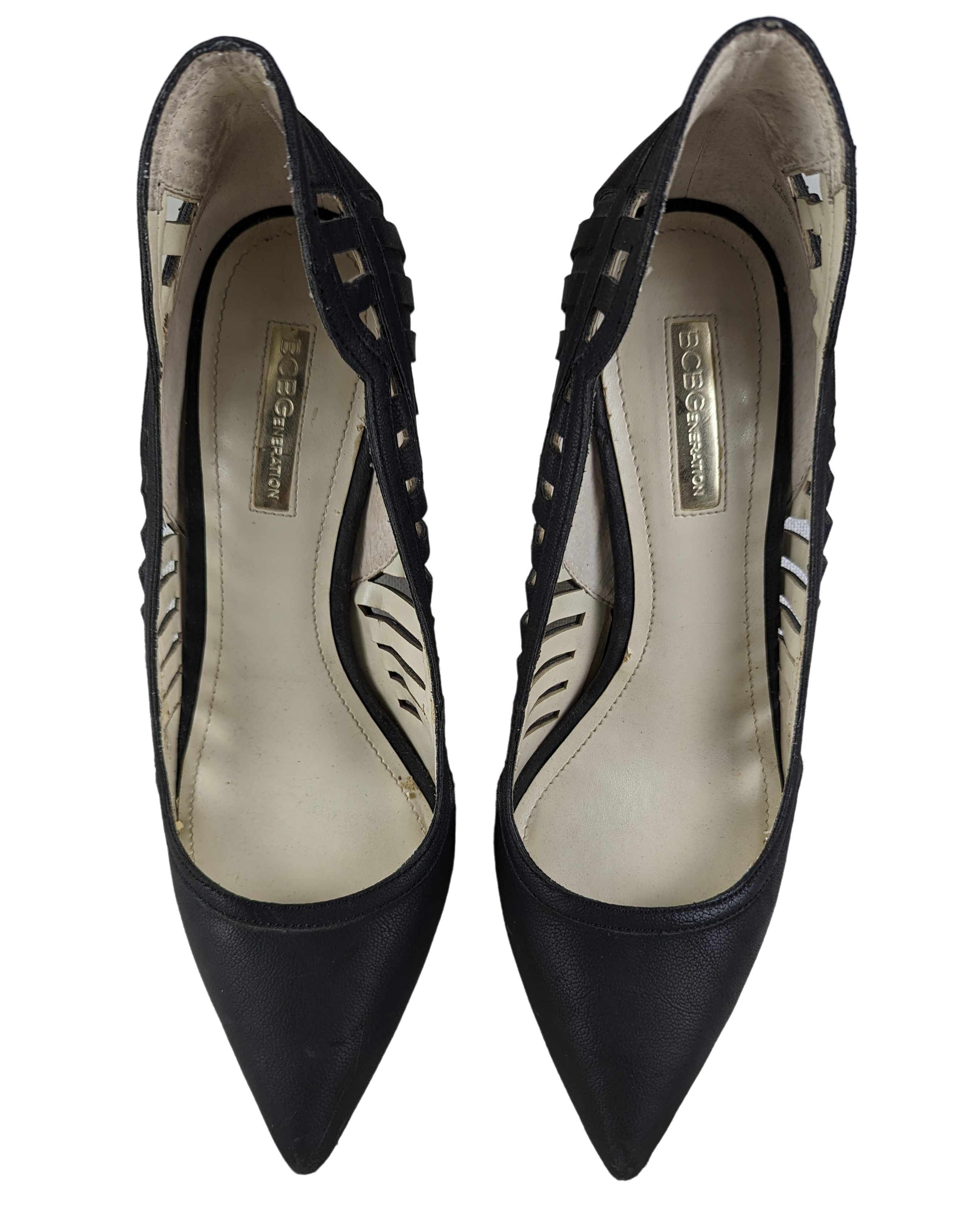 BCBGeneration Tillie Heels in Black Size 9 Elevate every step with BCBGeneration Tillie Heels! These black 4 inch heels feature stylish cut outs on the sides and are