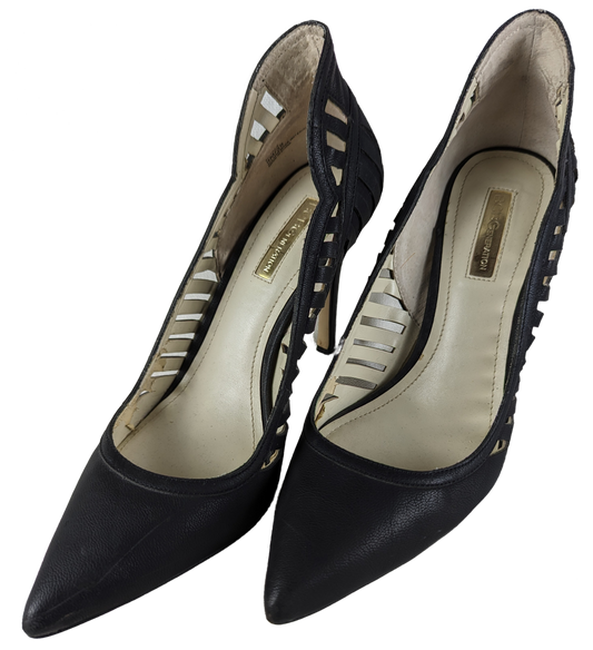 BCBGeneration Tillie Heels in Black Size 9 Elevate every step with BCBGeneration Tillie Heels! These black 4 inch heels feature stylish cut outs on the sides and are