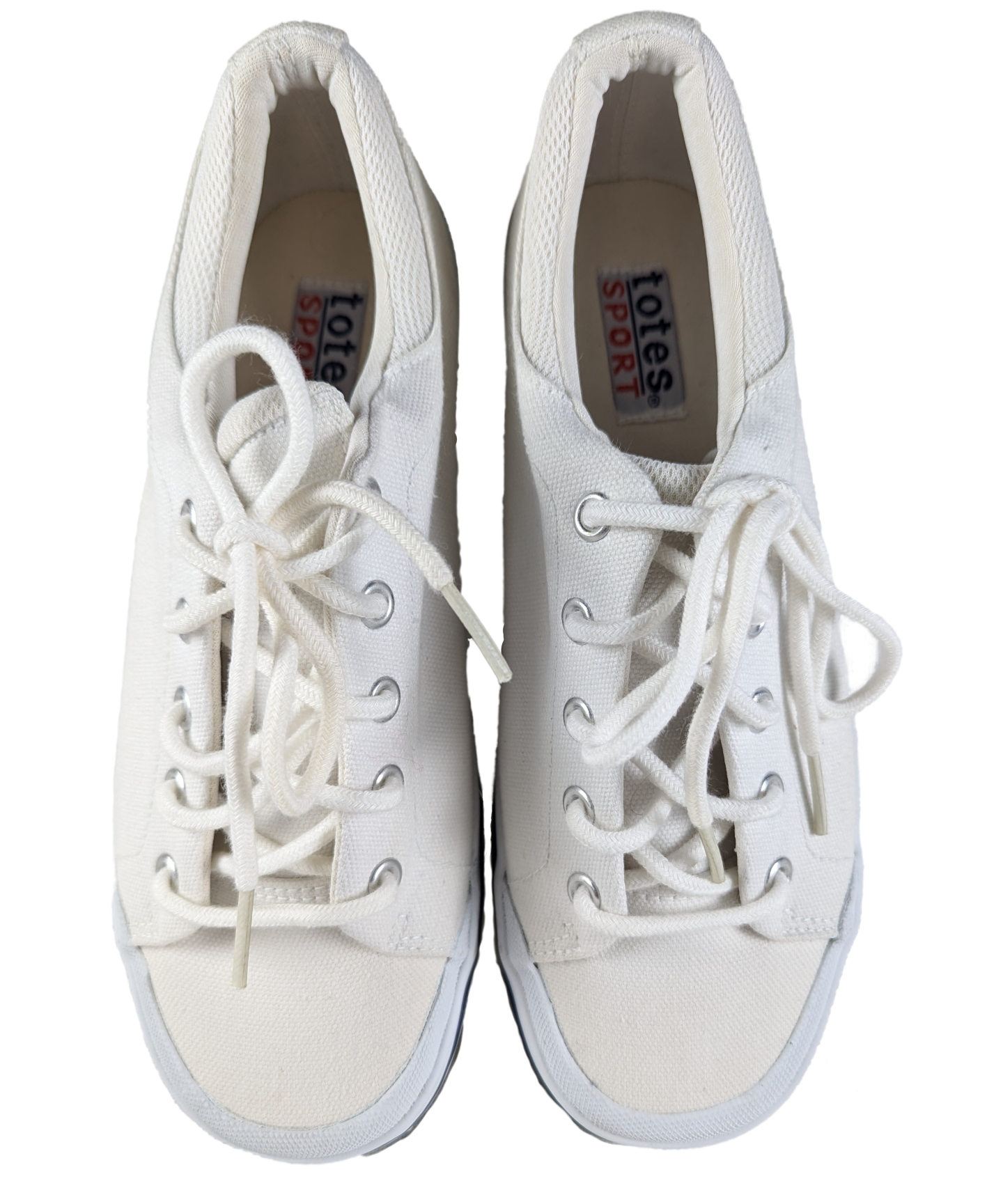 Totes Sport White Sneakers Size 8W Elevate your style and comfort with Totes Sport White Sneakers. Designed with a canvas upper and rubber sole, these sneakers provi