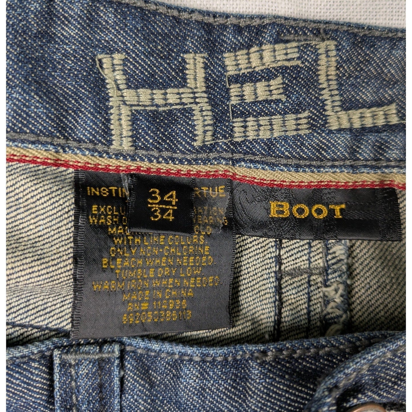 Helix Boot Cut Men's Jeans with Embroidered Pockets Size 34/34 Sustainable fashion isn't about compromise—it's about choosing pieces with soul. This pair carries his