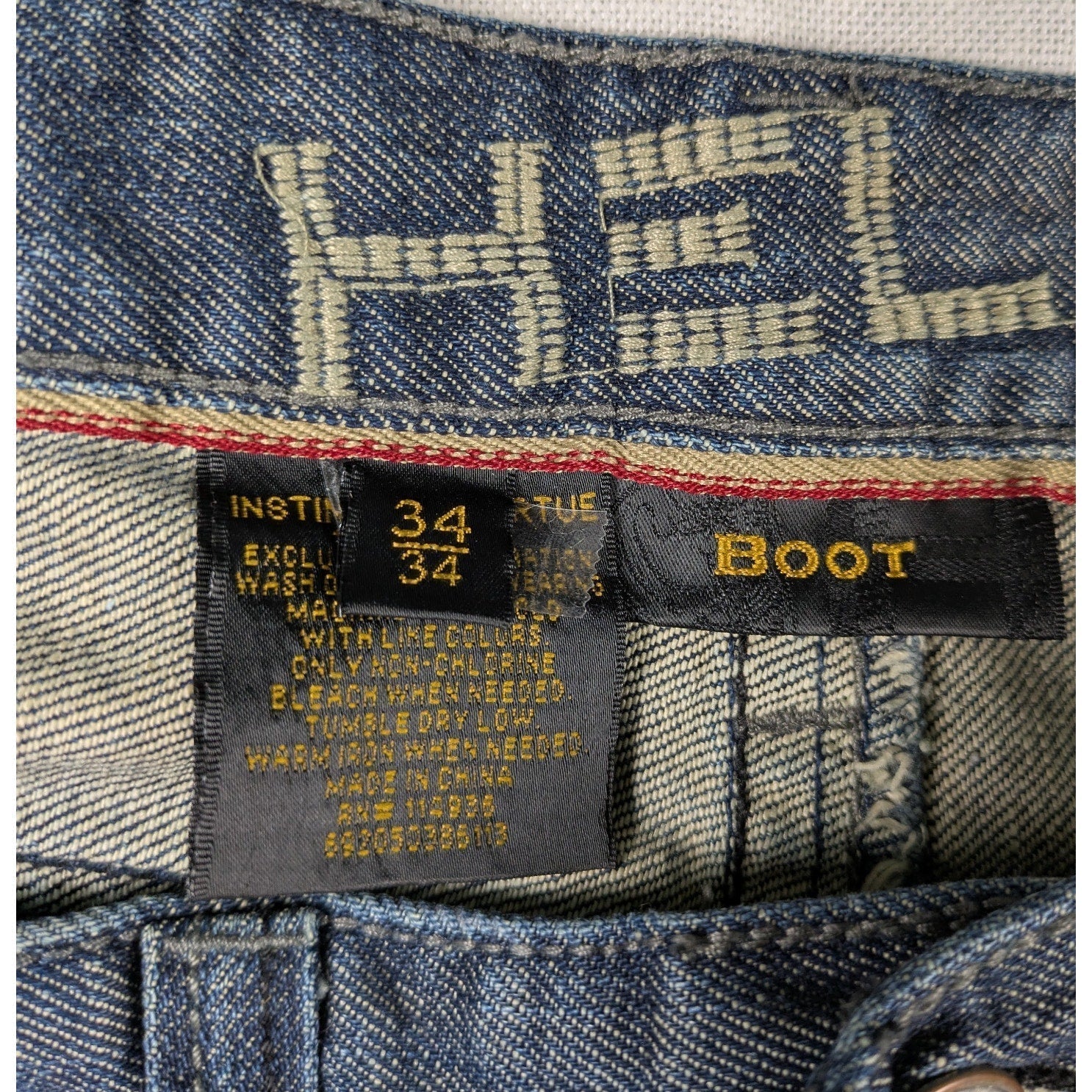 Helix Boot Cut Men's Jeans with Embroidered Pockets Size 34/34 Sustainable fashion isn't about compromise—it's about choosing pieces with soul. This pair carries his