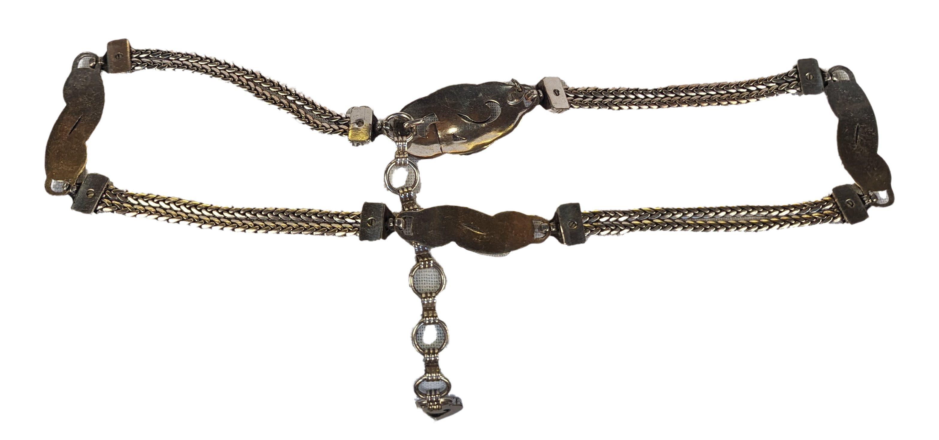 Brighton Bali Hai Silver-tone Chain Belt belt features two substantial chains with intermittent flourishes and connectors, the same design on the buckle, and the signaturbeltBrighton Bali Hai Silver-tone Chain BeltBrighton Bali Hai Silver-tone Chain Belt