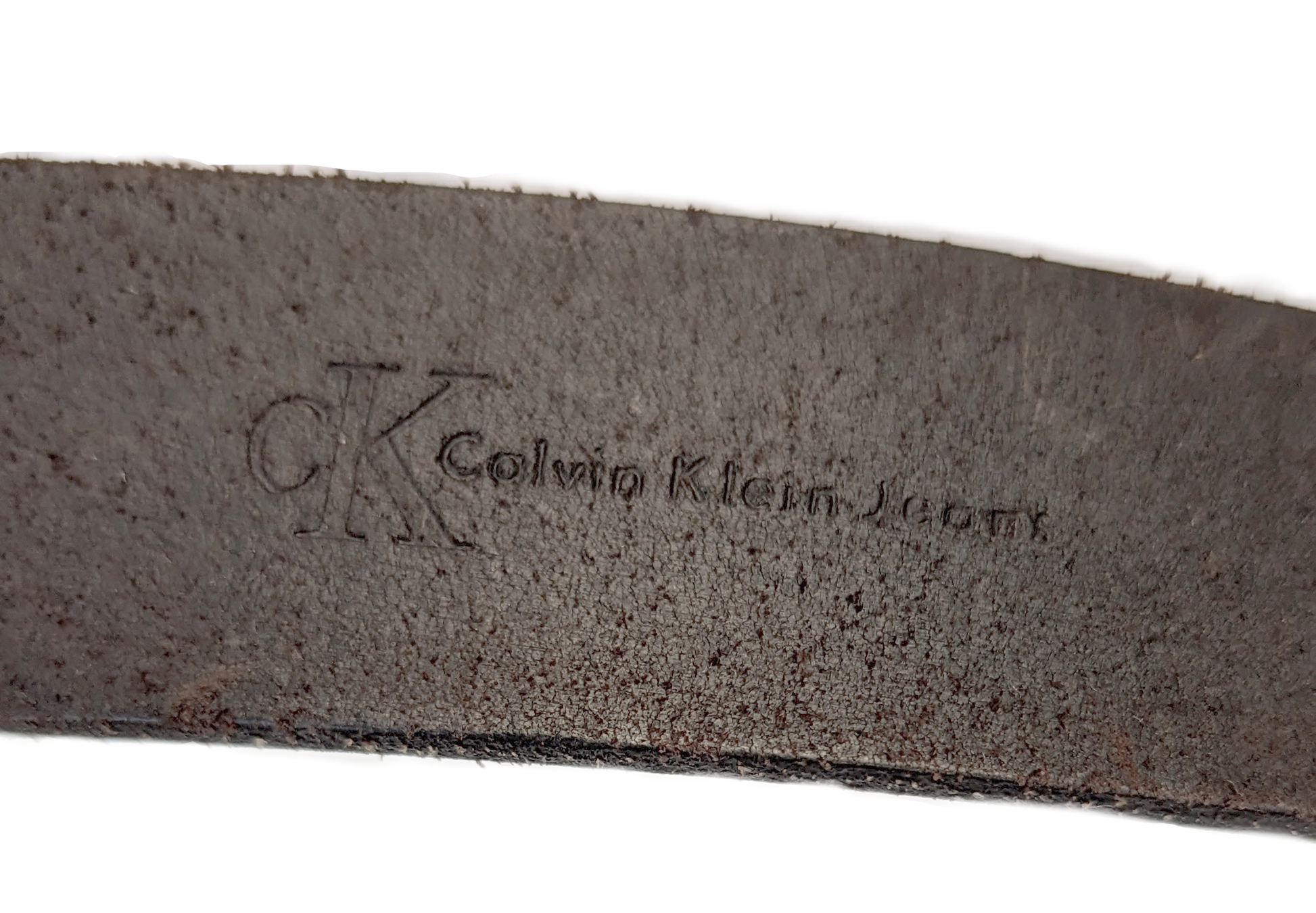 Calvin Klein Brown Leather Belt Calvin Klein brown leather belt will go perfect with your favorite jeans and boots!  The neutral color goes perfect with any outfit.  The silver tone metal is classibeltCalvin Klein Brown Leather BeltCalvin Klein Brown Leather Belt