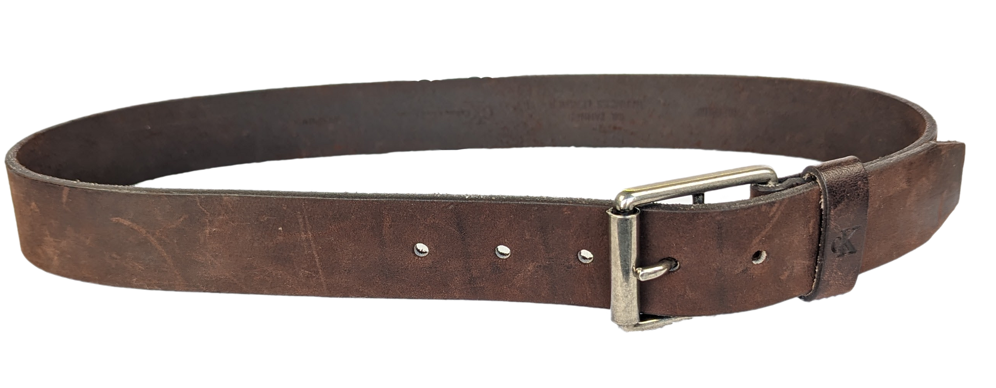 Calvin Klein Brown Leather Belt Calvin Klein brown leather belt will go perfect with your favorite jeans and boots!  The neutral color goes perfect with any outfit.  The silver tone metal is classibeltCalvin Klein Brown Leather BeltCalvin Klein Brown Leather Belt