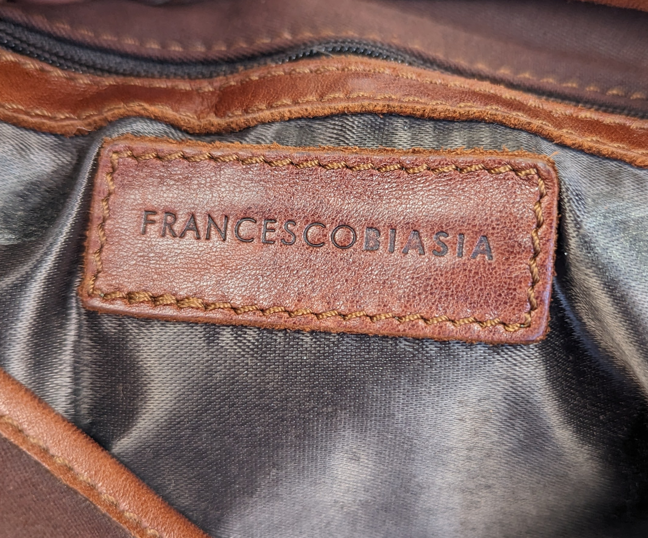 Francesco BiasiaVintage bag in excellent condition!  Lots of room for all your essentials - wallet, keys, makeup, etc...Purse, handbagFrancesco Biasia Leather and Fabric Messenger BagFrancesco Biasia Leather