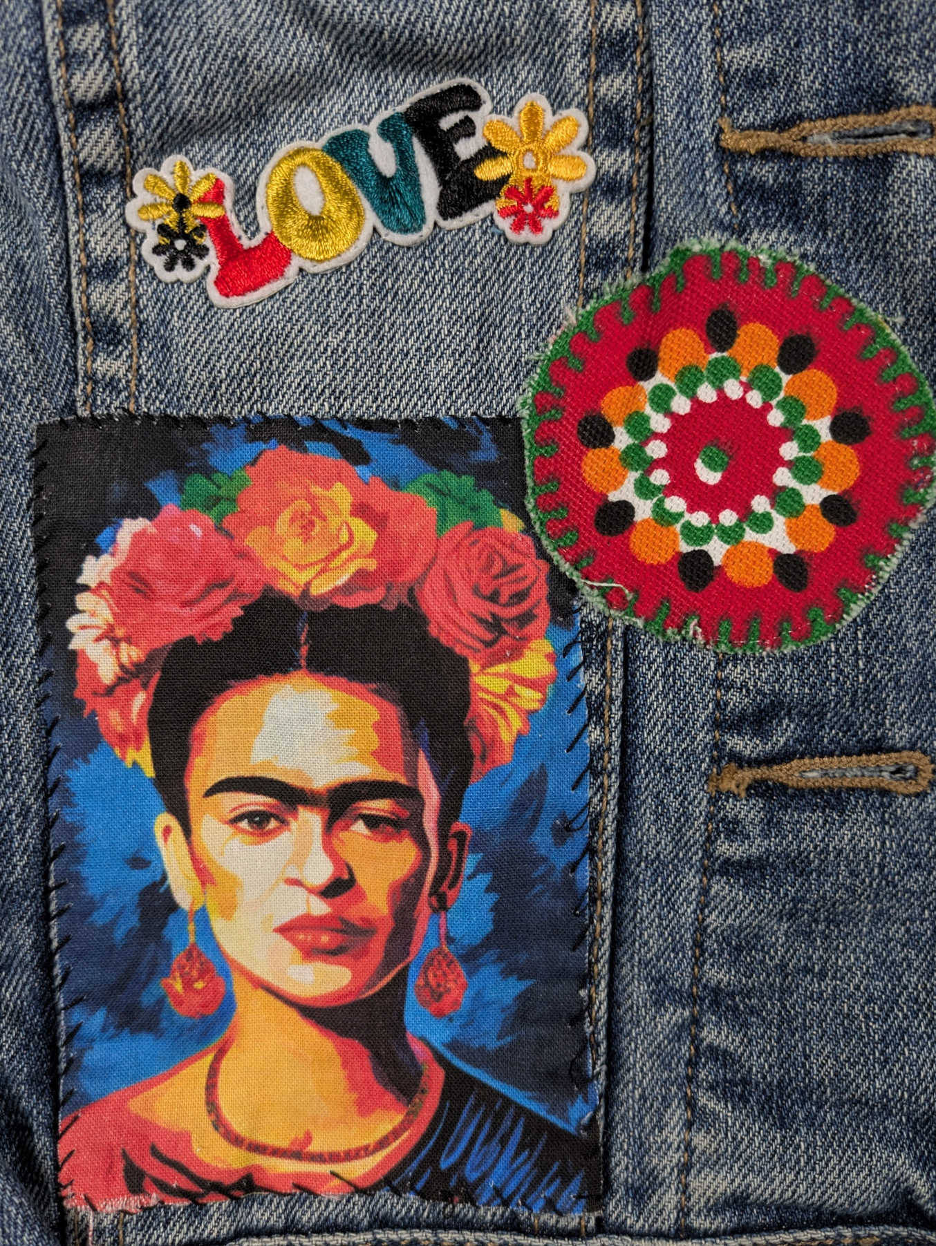 Refreshed - Apt. 9 Upcycled Denim Jacket Size M Frida Kahlo was an amazing woman, and this jacket shows her off!  Along with floral embellishments, her portrait crea