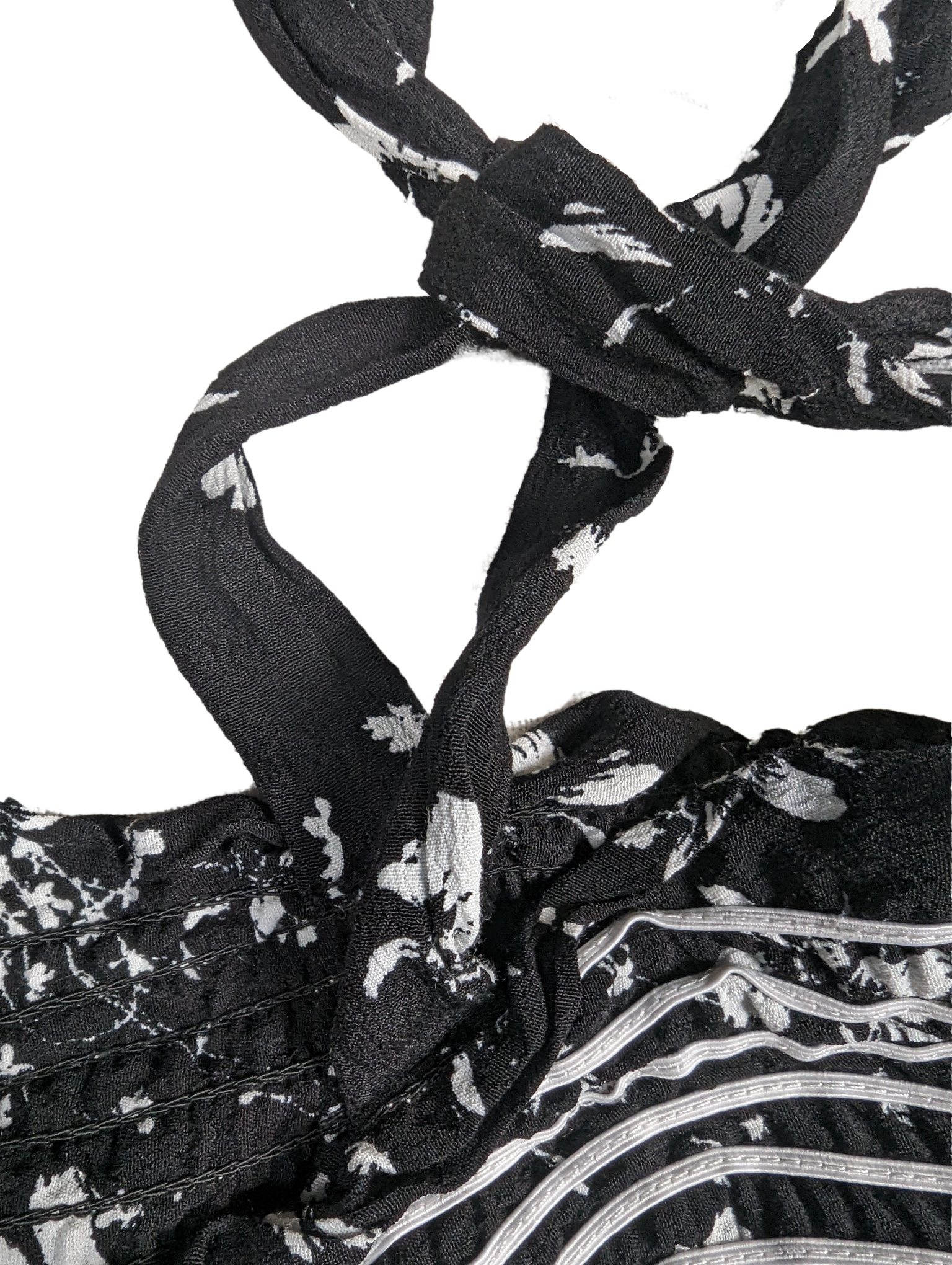 Free People Black and White Smocked Jumpsuit Size XS Go bold and free with the Free People Jumpsuit! This black and white stunner features adjustable shoulder ties a