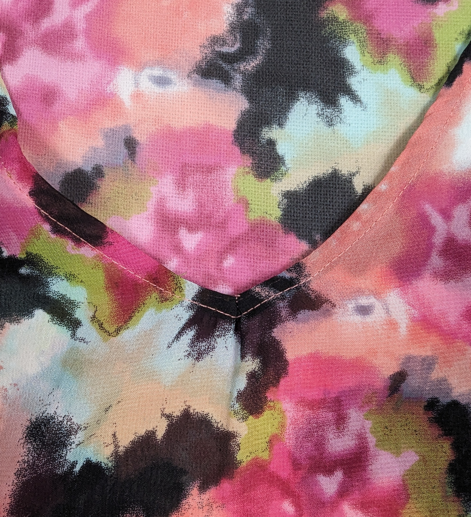 Show Me Your MuMu Abstract Print Sheer Top Be bold and playful in the Show Me Your MuMu Abstract Print Sheer Top. This semi-sheer top features a vibrant abstract floral print, perfect for making a statement. 