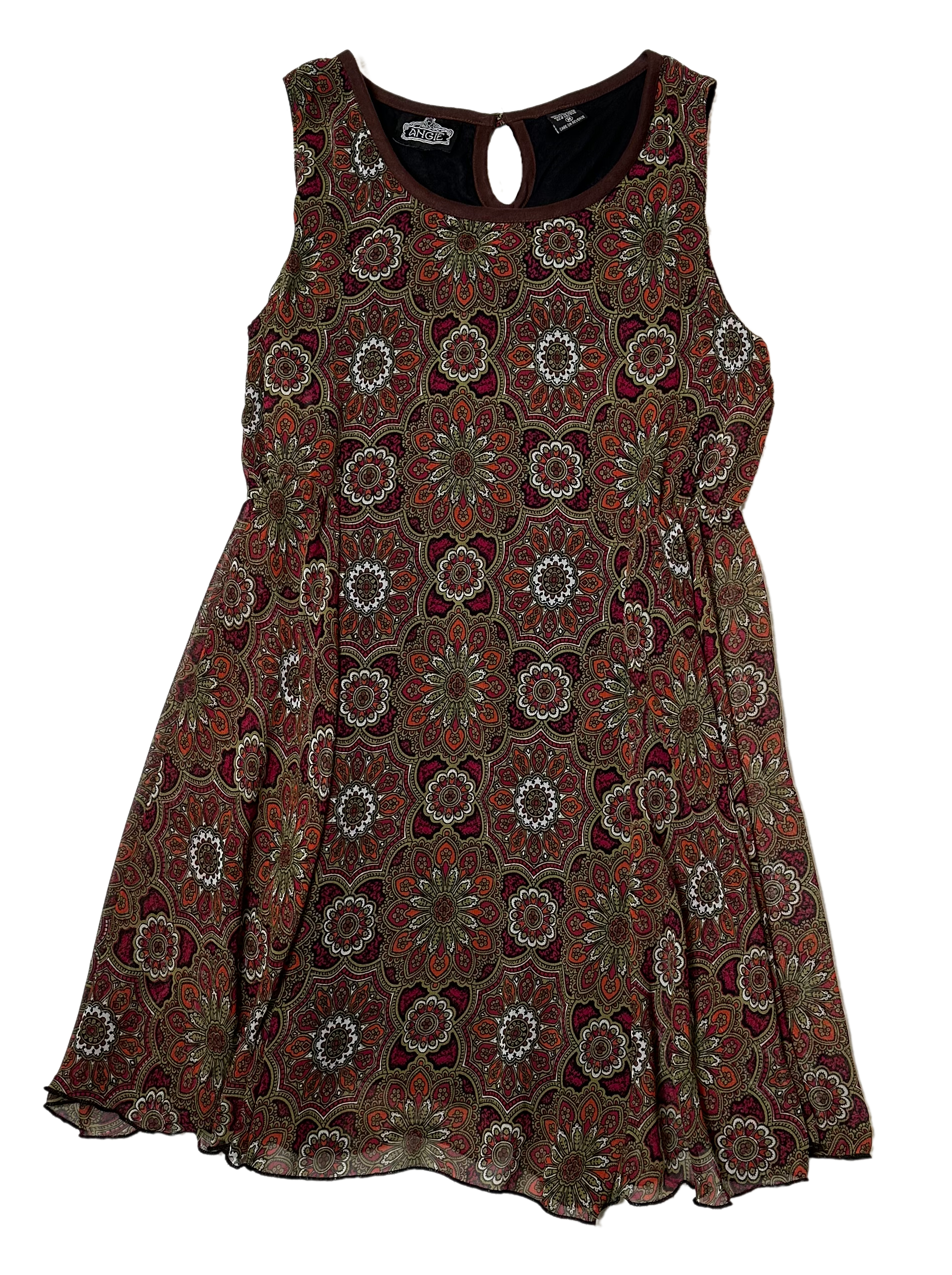 AngieStep out in style this season wearing our Angie sleeveless crew neck dress! This stunning dress is printed with a classic medallion pattern in beautiful fall colors DressesAngie Sleeveless Crew Neck Dress with Fall Color PrintAngie Sleeveless Crew Neck Dress