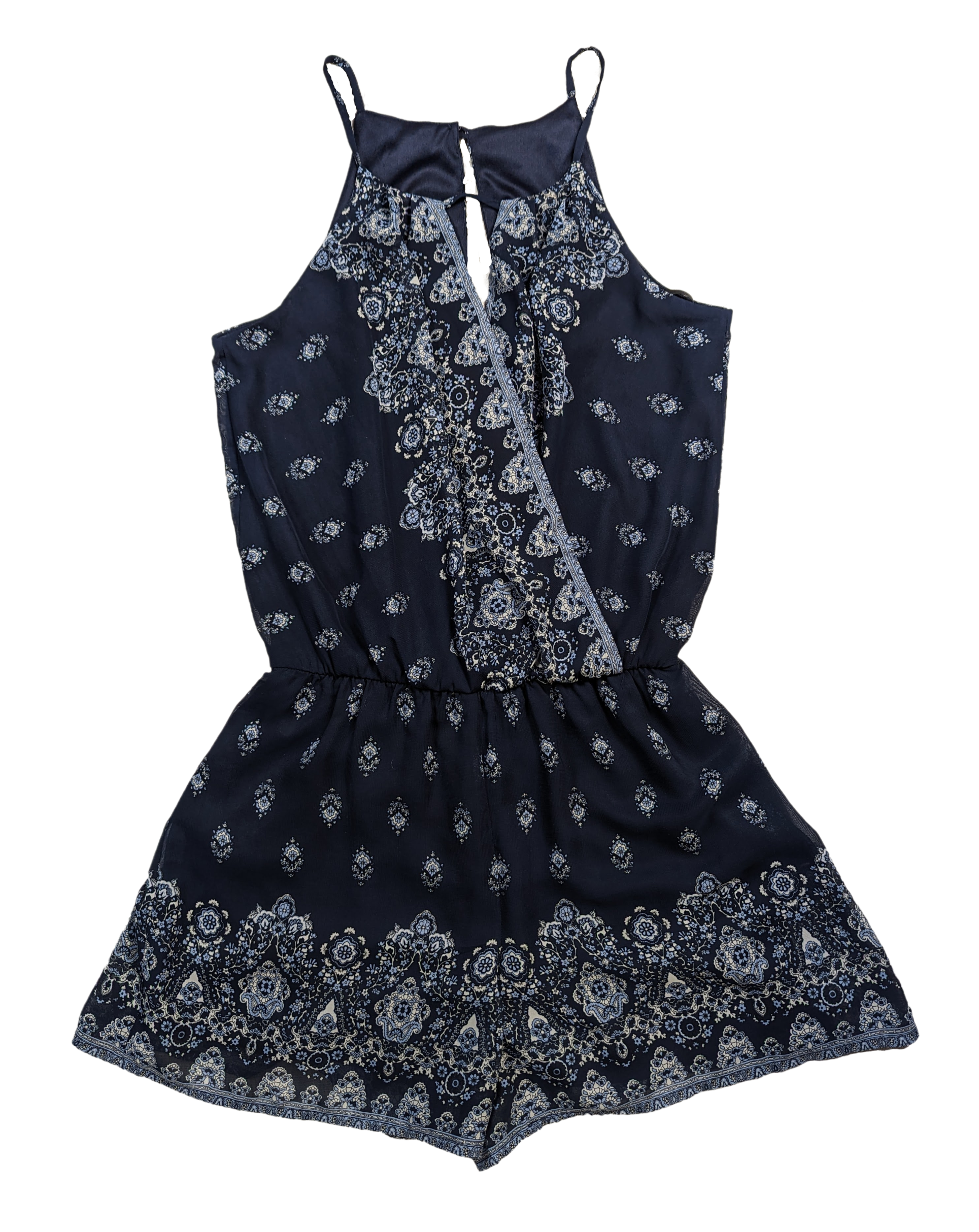 BCX Navy Halter Neck Romper Size XS NWT  Go ahead, BCX your fashion game with this navy halter neck romper. Perfect for any occasion, the stylish print and flatterin
