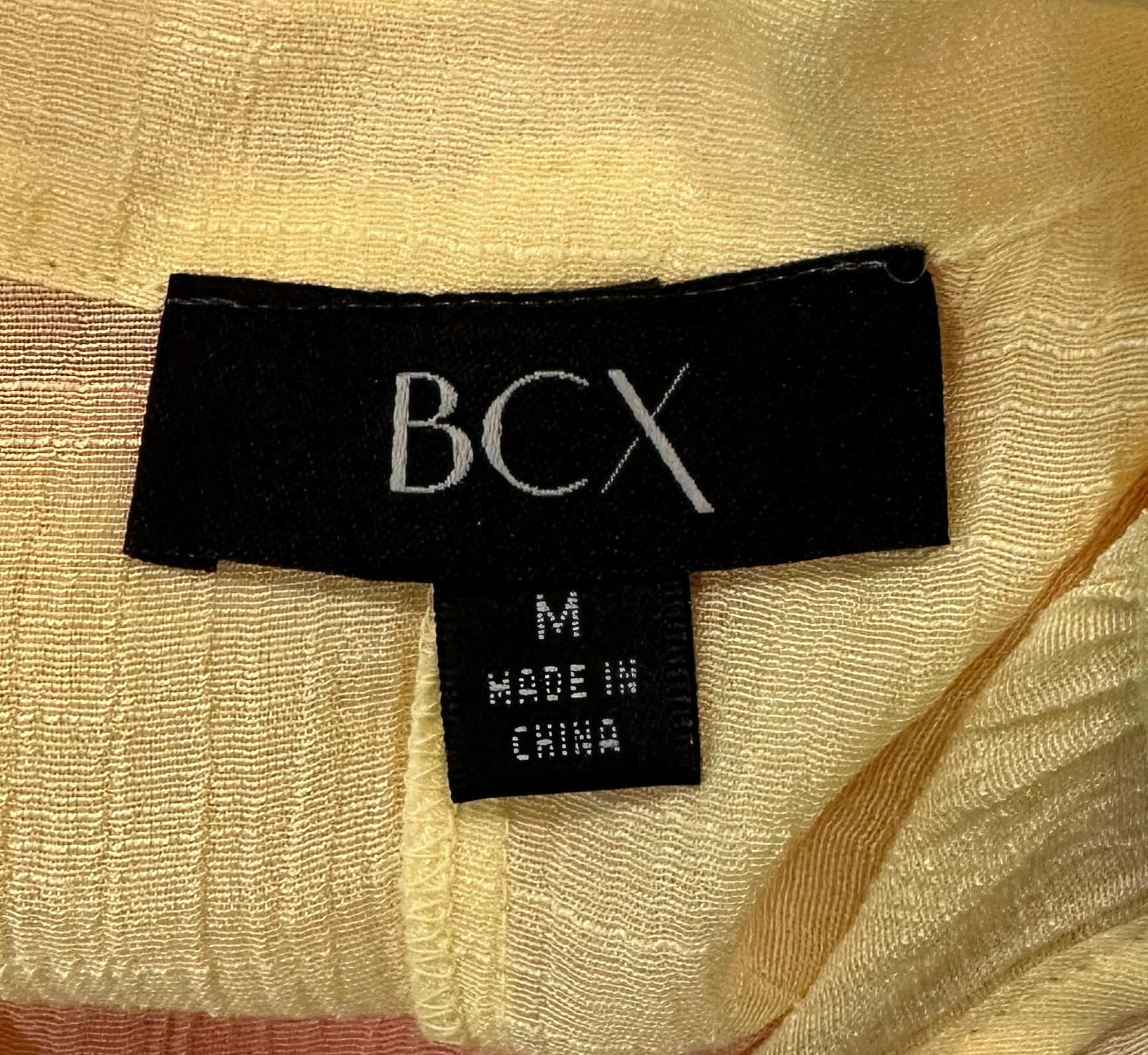 BCXThis BCX blouse gives you a colorful take on the peasant-style. The stylish ombre in pink and yellow will draw all the attention, while the elastic hem and metal-detShirts & TopsBCX Ombre Cold Shoulder Peasant BlouseBCX Ombre Cold Shoulder Peasant Blouse