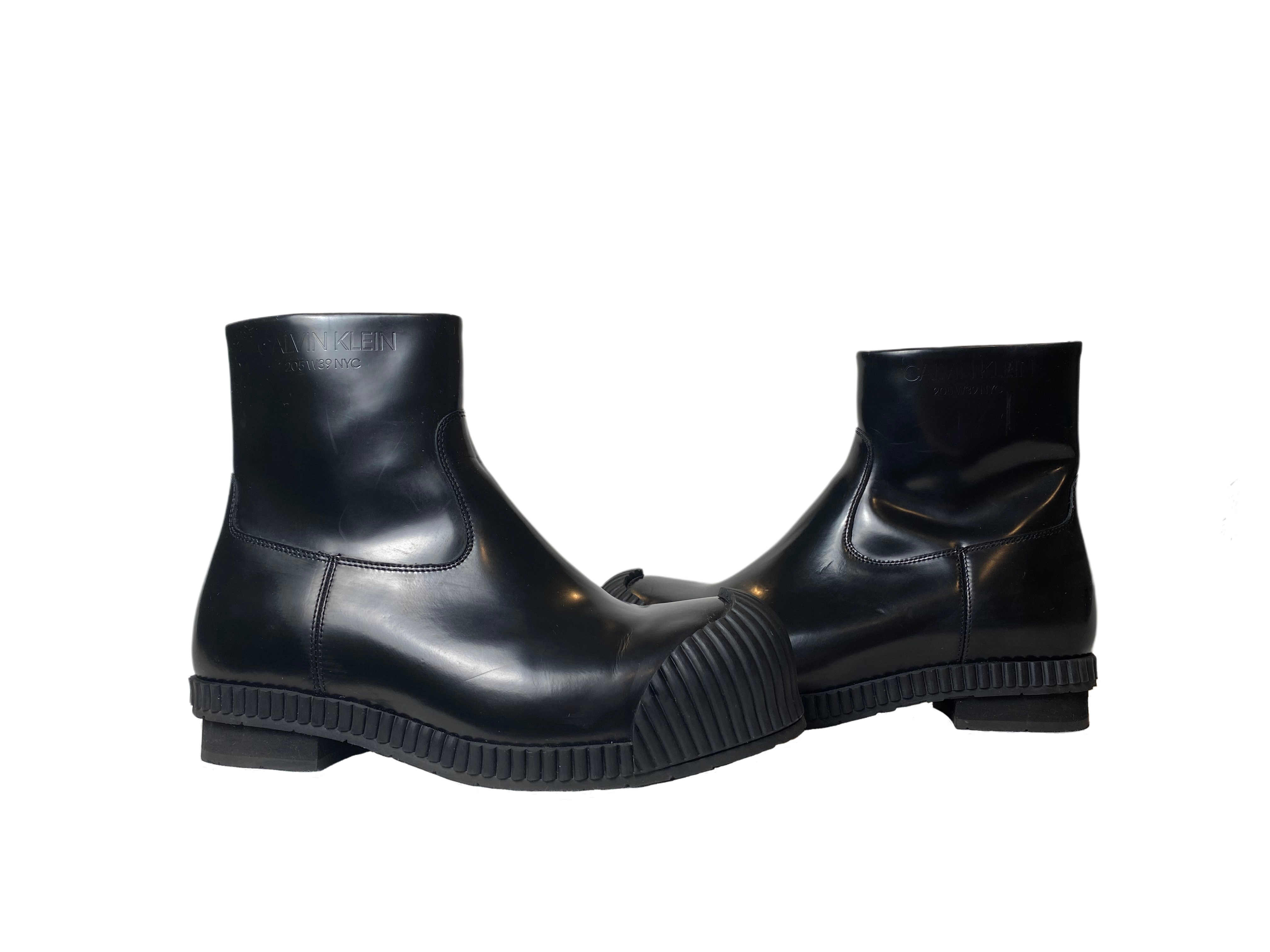 Calvin KleinStep up your fashion game with these Calvin Klein Deicine Spazzolato (205W39NYC) black leather ankle boots! These sleek and stylish boots are dressed to kill with a ShoesCalvin Klein Deicine Spazzolato Black Leather Ankle BootsCalvin Klein Deicine Spazzolato Black Leather Ankle Boots