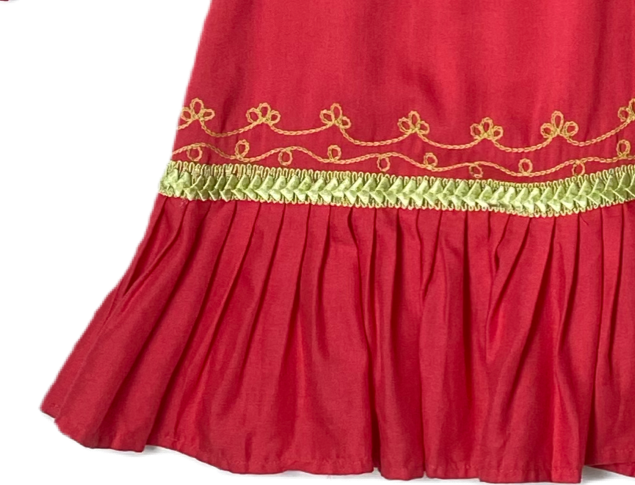 Moda International Embroidered Detail Dress Moda International embroidered detail dress with long sleeves and a ruffle hem. Dress to impress with this Moda Internati