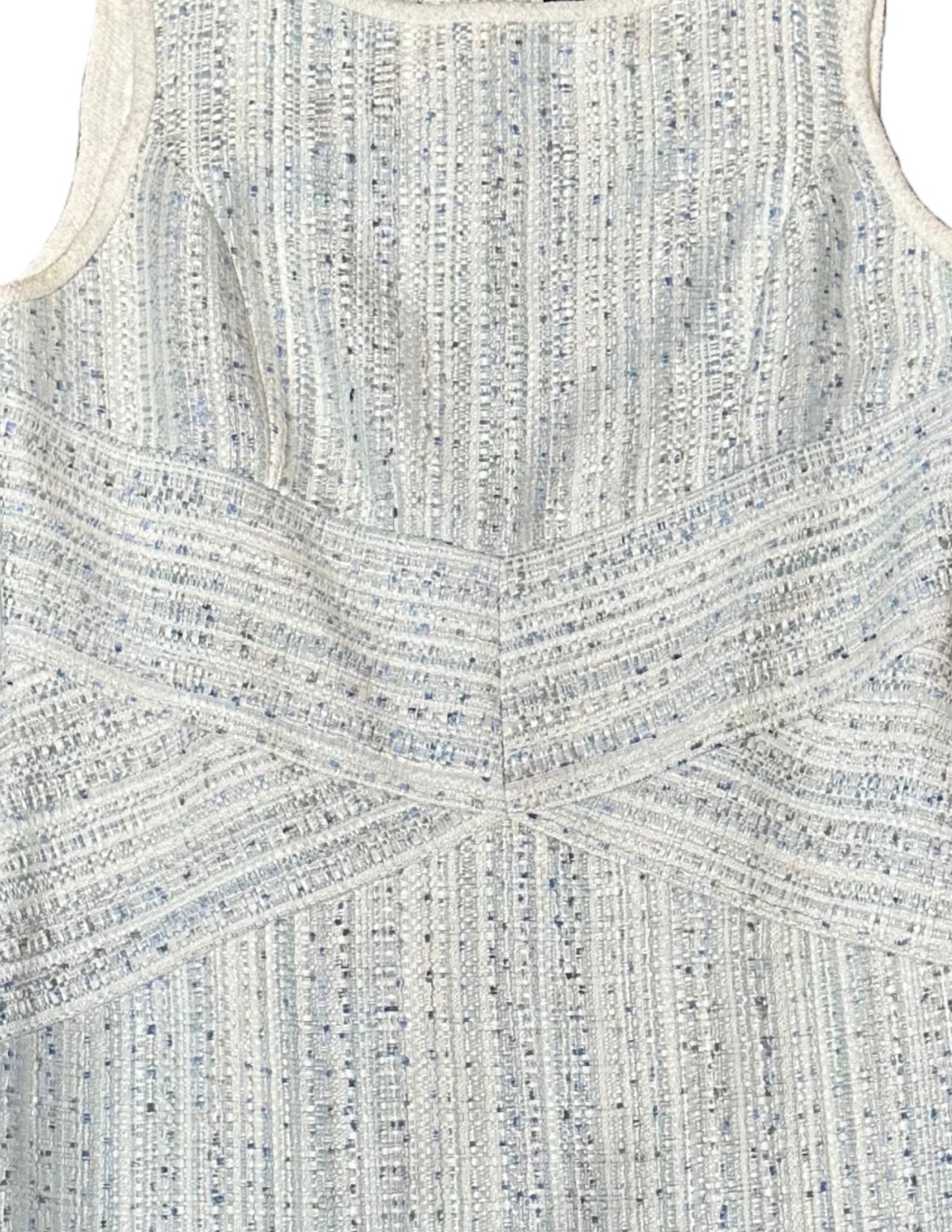 Karl Lagerfeld Paris Jacquard Metallic Light Blue Tweed Sleeveless Dre This Karl Lagerfeld Paris dress is an elegant addition to any wardrobe. The criss cross waist 