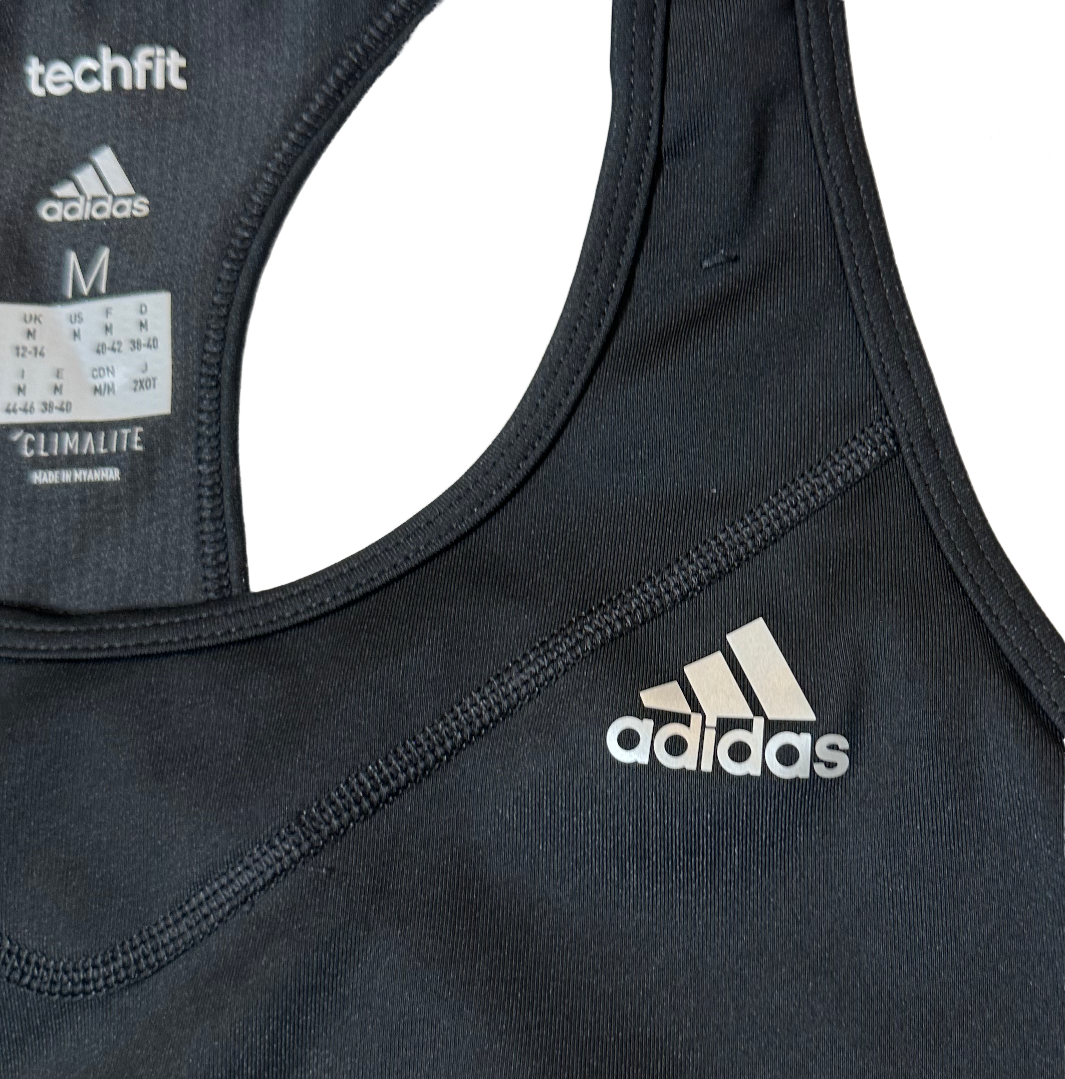 Adidas Techfit Climate Black Sports Bra size Medium Get ready to crush your workout with this Adidas Techfit Climate black sports bra in size medium. Featuring a razor ba