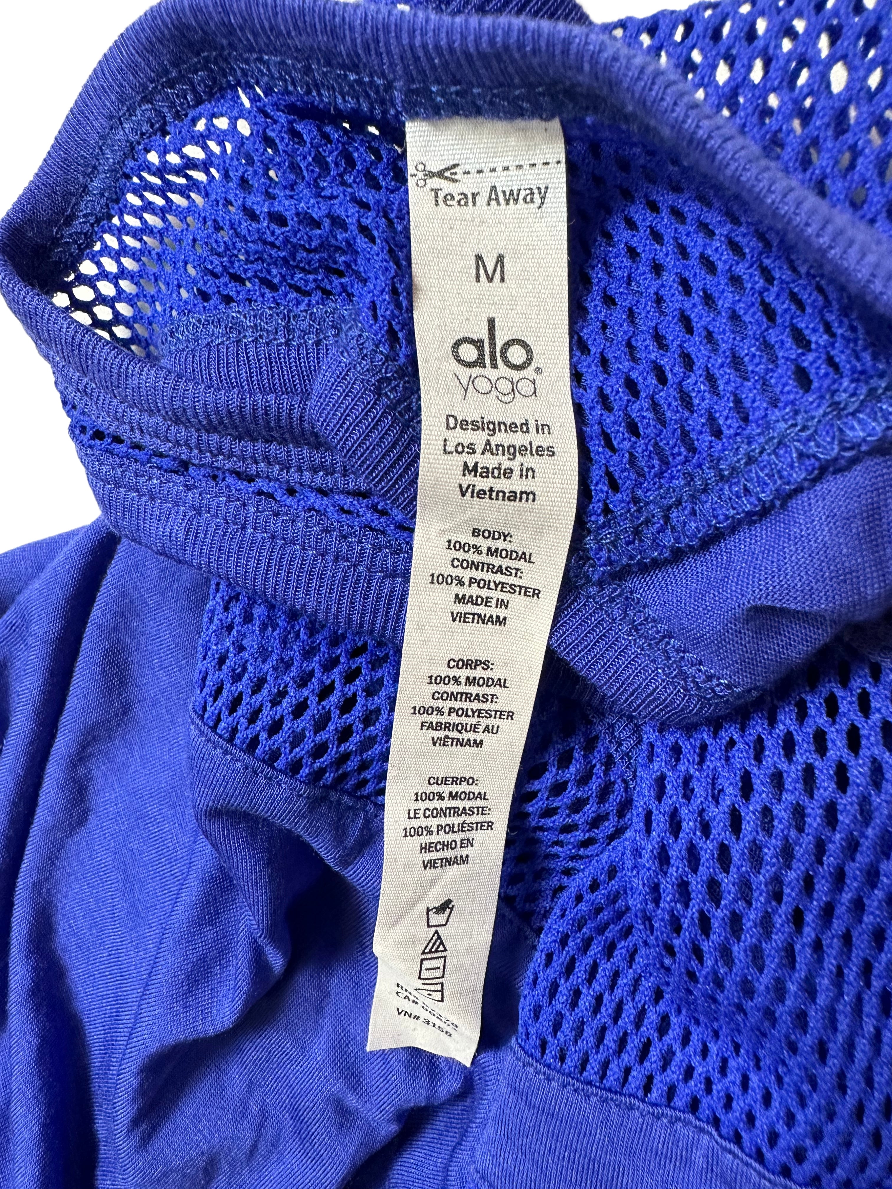 aloThis bright blue new with tags Alo Yoga tank has got it all! Look stylish with the razor back design and mesh details, and feel comfortable with the breathable fabriTank TopAlo Yoga Bright Blue Razor Back Tank with Mesh Details - NWTAlo Yoga Bright Blue Razor Back Tank