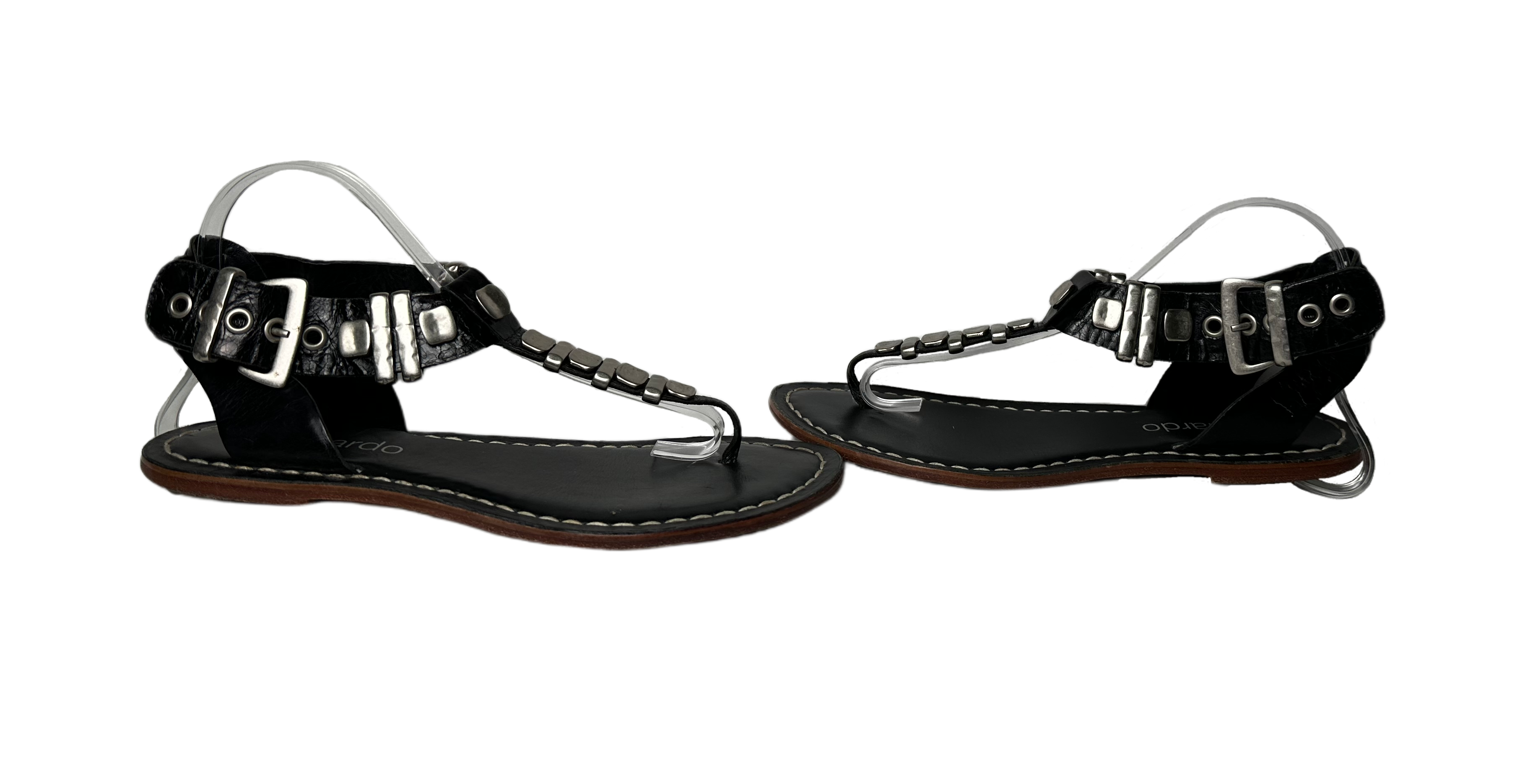 BernardoEmbrace bold style with the Bernardo Milan sandal! Crafted from smooth leather and featuring chunky silver metal accents, these T-strap sandals will inspire your advShoesBernardo Milan Flat T-strap Black Leather Sandal-strap Black Leather Sandal