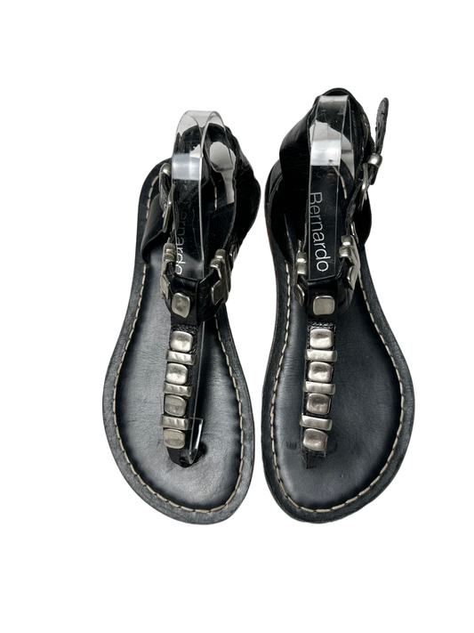 BernardoEmbrace bold style with the Bernardo Milan sandal! Crafted from smooth leather and featuring chunky silver metal accents, these T-strap sandals will inspire your advShoesBernardo Milan Flat T-strap Black Leather Sandal-strap Black Leather Sandal