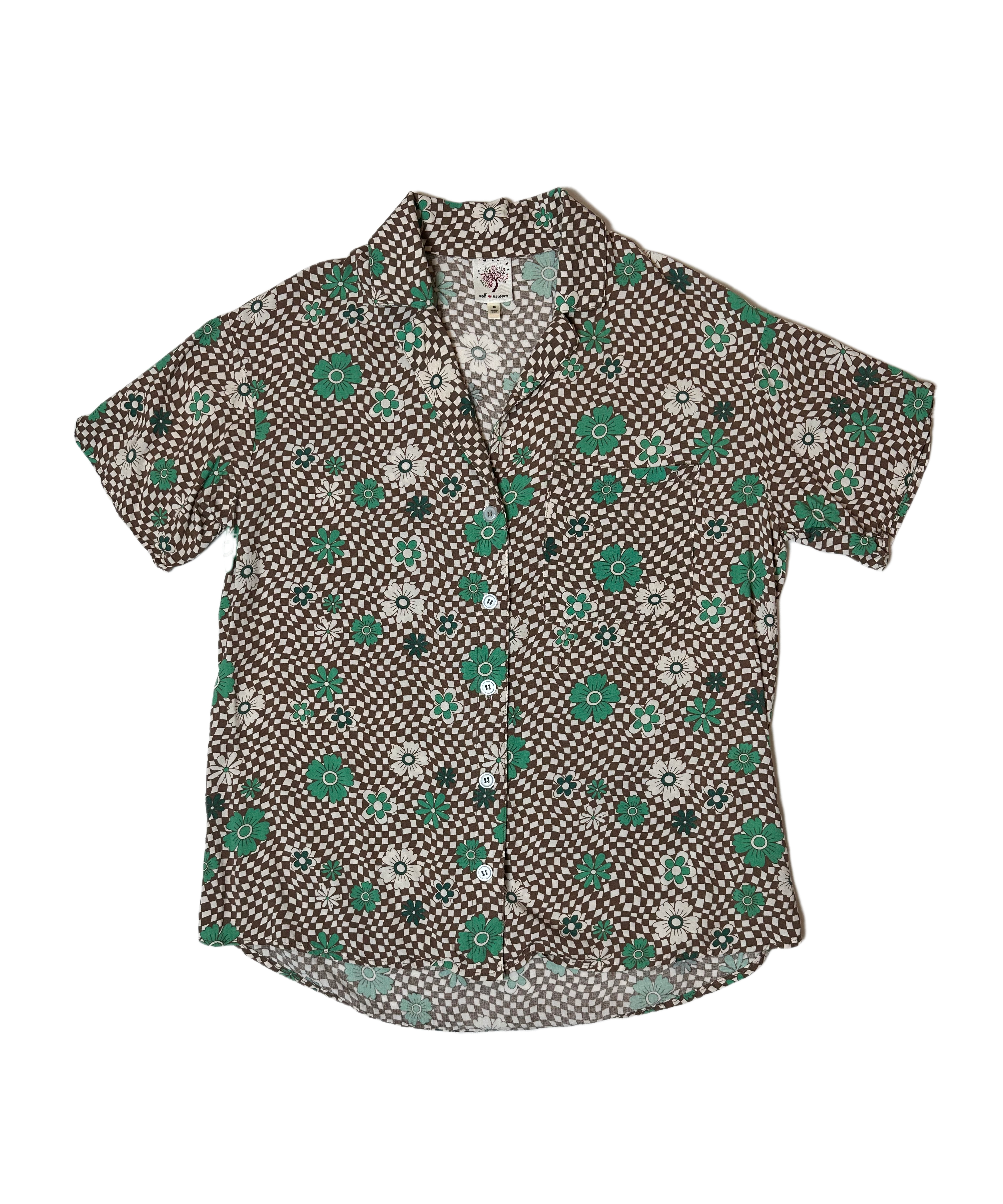 Self Esteem Short Sleeve Retro Floral Print Blouse is a vintage wardrobe must-have! With its funky retro floral and checker print in earthy green and brown hues, you'll exude confShirtSelf Esteem Short Sleeve Retro Floral Print BlouseEsteem Short Sleeve Retro Floral Print Blouse