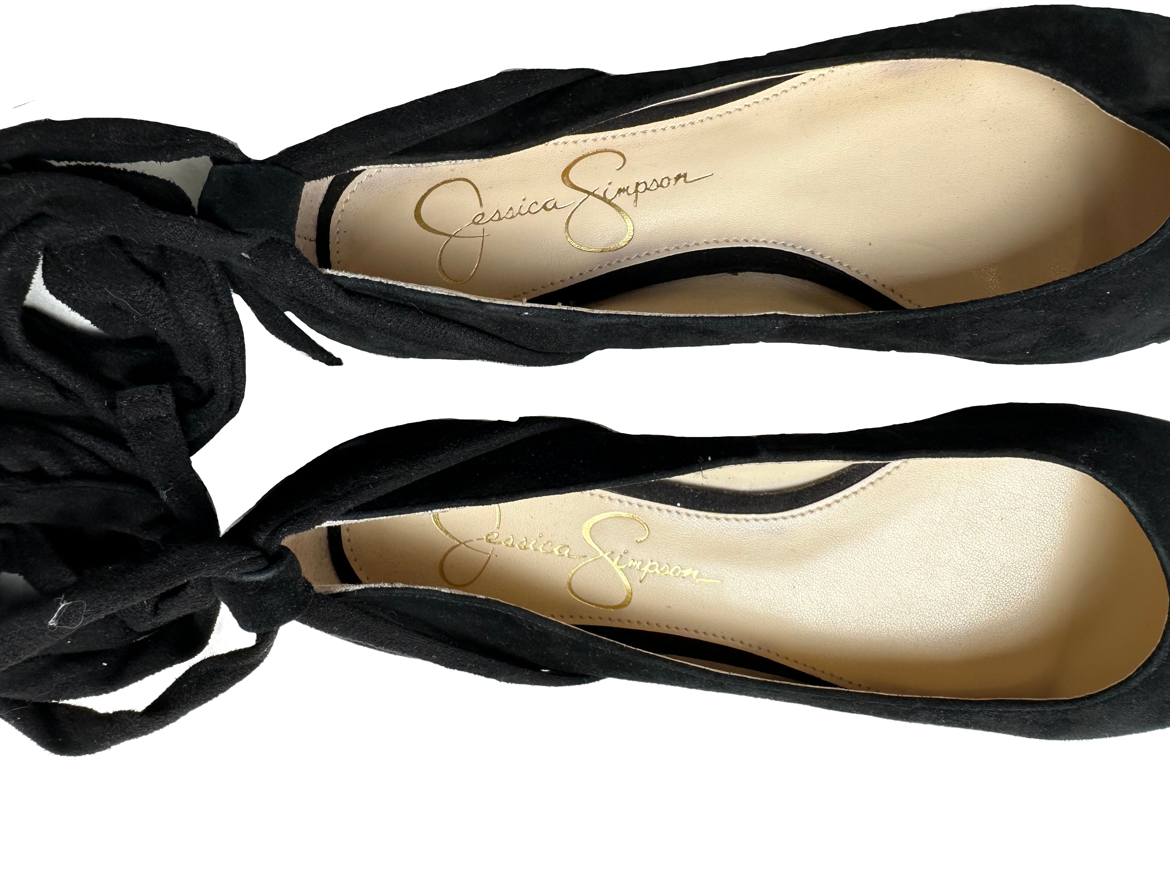 Jessica Simpson Black Suede Lace Up Ballerina Flats offer a classic style with a modern edge. Crafted from luxury suede, featuring a round toe and lace up designShoesJessica Simpson Black Suede Lace Up Ballerina FlatsJessica Simpson Black Suede Lace