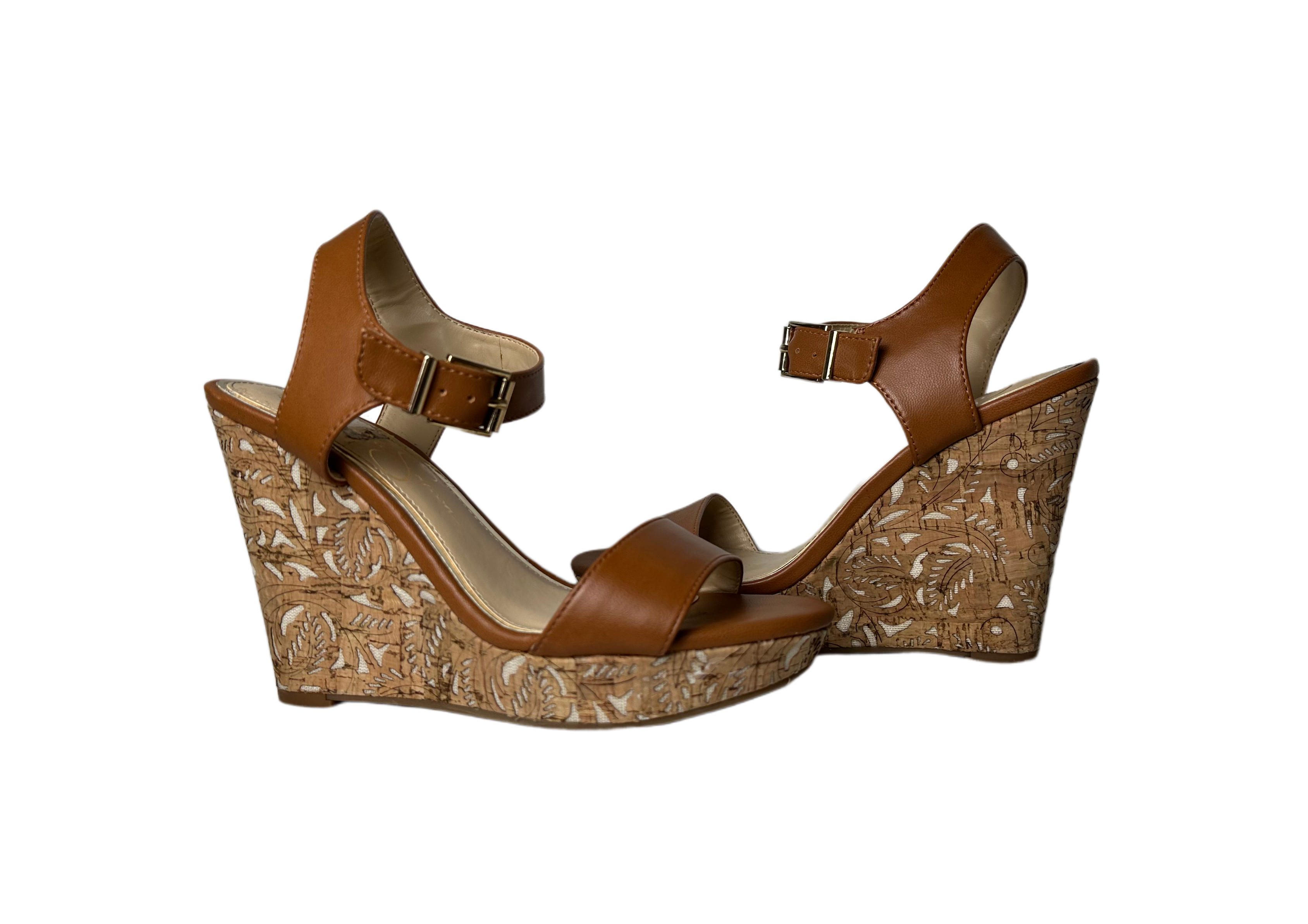 Jessica SimpsonComplete your look with the Jessica Simpson Cork Cut Out Wedge. This beautiful sandal features an elevated wedge shape with a decorative cork overlay, and a classic ShoesJessica Simpson Cork Cut Out Wedge with Brown Ankle Strap - EUCJessica Simpson Cork Cut