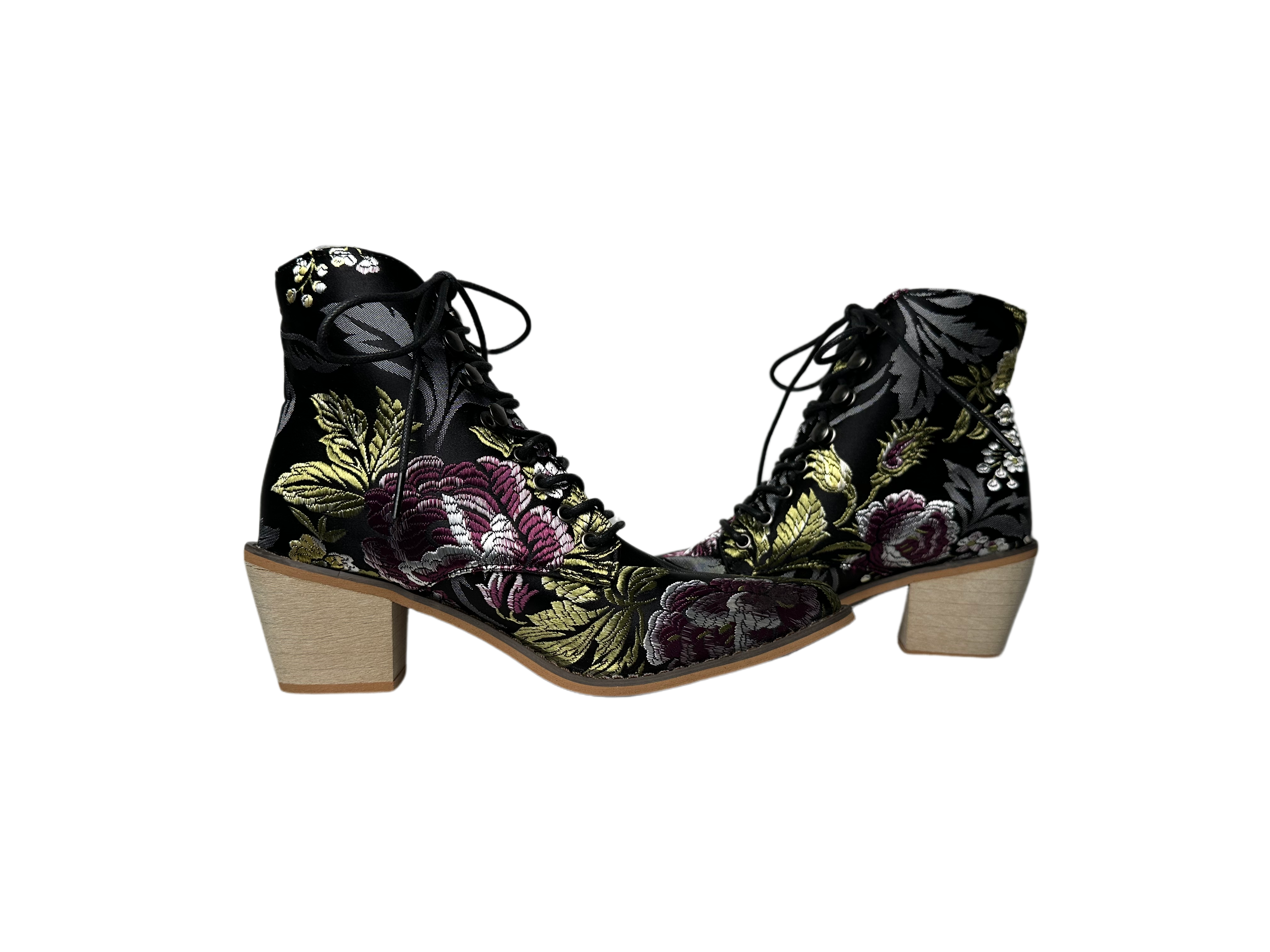 No BrandLook stylish while wearing this beautiful floral ankle boot. It features a bright floral embroidered fabric upper and a light block wood heel for a slightly western ShoesBeautiful Floral Fabric Lace Up Ankle Boot with Light Wood HeelBeautiful Floral Fabric Lace