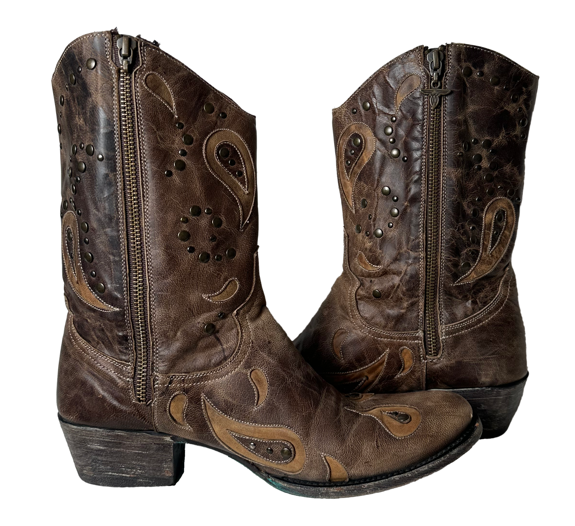 Lane Boots Brown with Cut-Outs, Studs and Side Zips Cowboy Cowgirl Slip into these Lane Boots with ease thanks to the convenient side zips, while the round toe and l