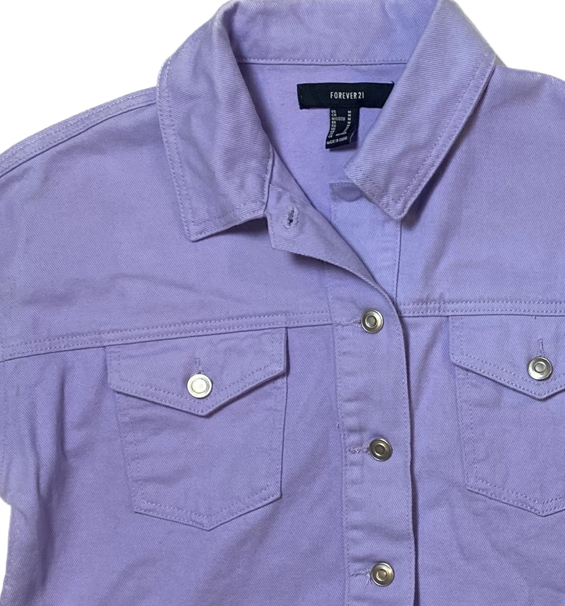 Forever 21 Lavender Crop Denim JacketLove this jacket! It's the ideal color to wear in any time of the year!Pair this with a plaid shirt, jeans and boots, or a sundress and espadrilles. 