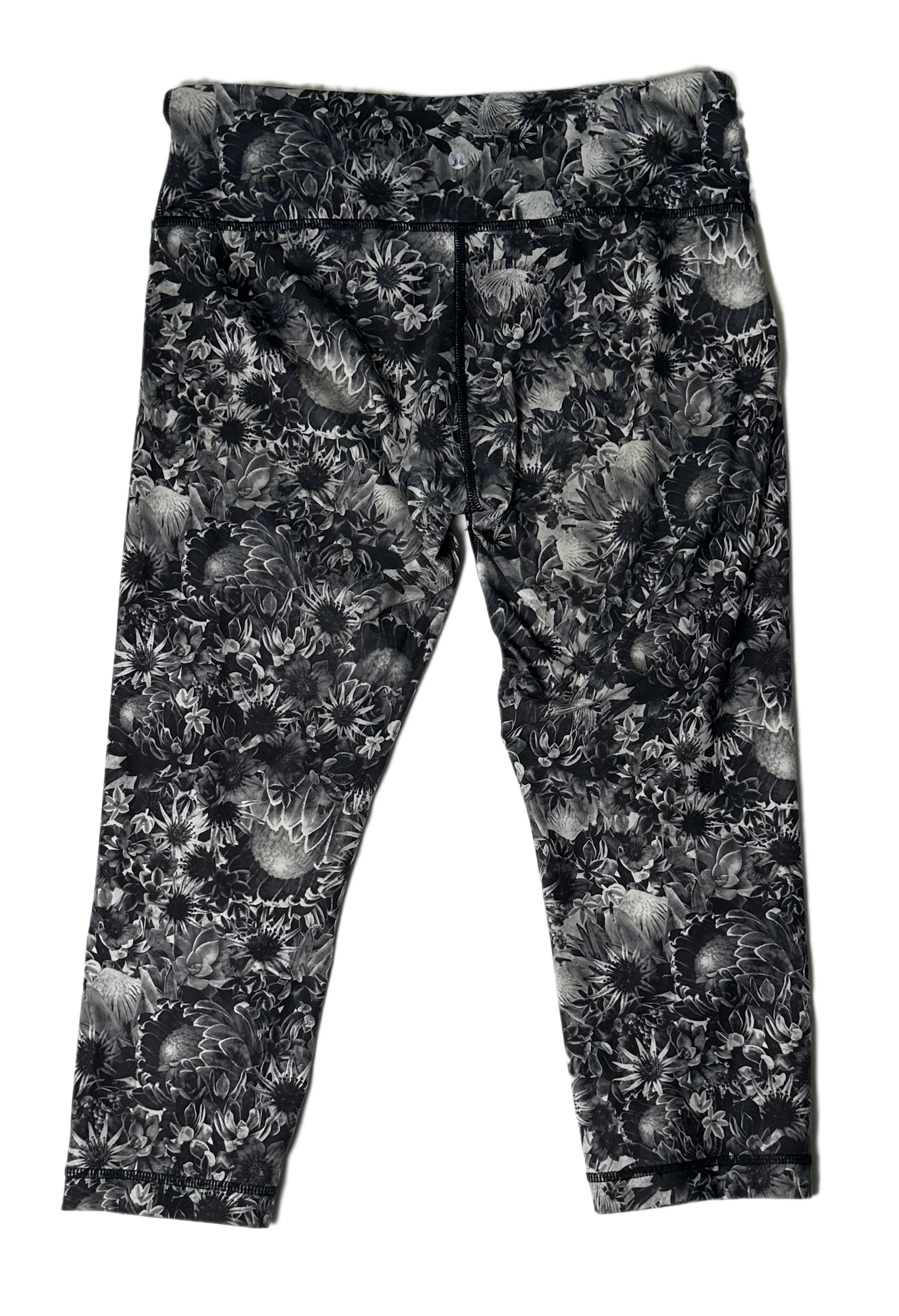 LululemonFeel flower-power strong in these fashionable Lululemon Black &amp; Grey Floral Print Cropped Leggings! Their cropped style offers breathability and comfort, while tLeggingsLululemon Black & Grey Floral Print Cropped LeggingsLululemon Black & Grey Floral Print Cropped Leggings