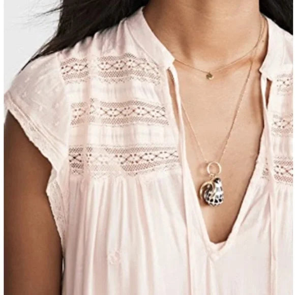 Free People Blush Midnight Midi Dress Size Large Indulge in a touch of blush with the Free People Midnight Midi Dress. This playful v-neck dress will have you feelin