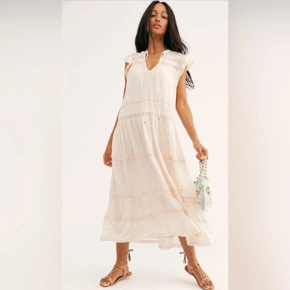 Free People Blush Midnight Midi Dress Size Large Indulge in a touch of blush with the Free People Midnight Midi Dress. This playful v-neck dress will have you feelin