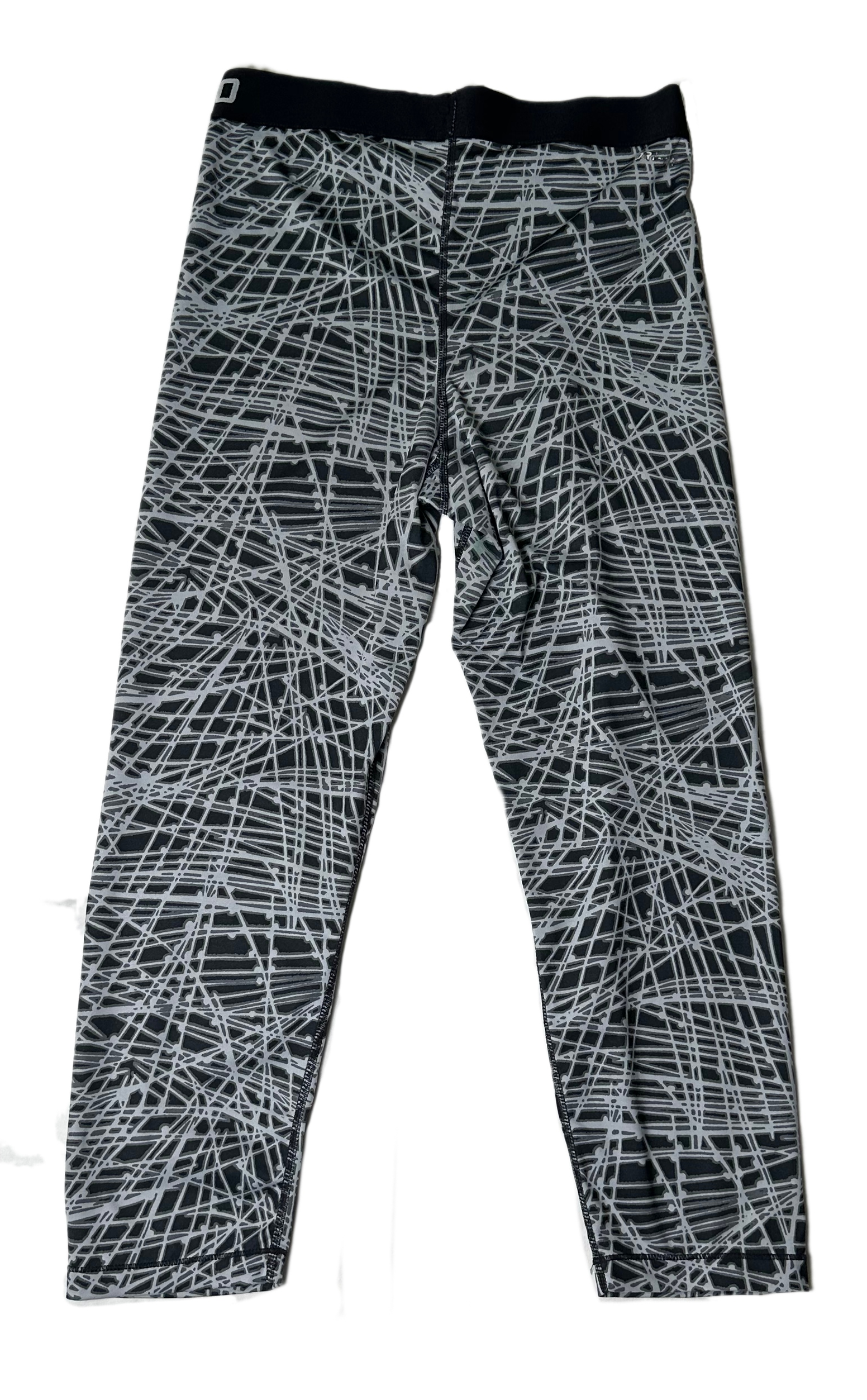 NikeStep up your game in these Nike Pro cropped leggings! Show off the cool and crazy graphic print in black and grey, while staying comfortable with their incredibly soLeggingsNike Pro Black and Grey Print Cropped LeggingsGrey Print Cropped Leggings