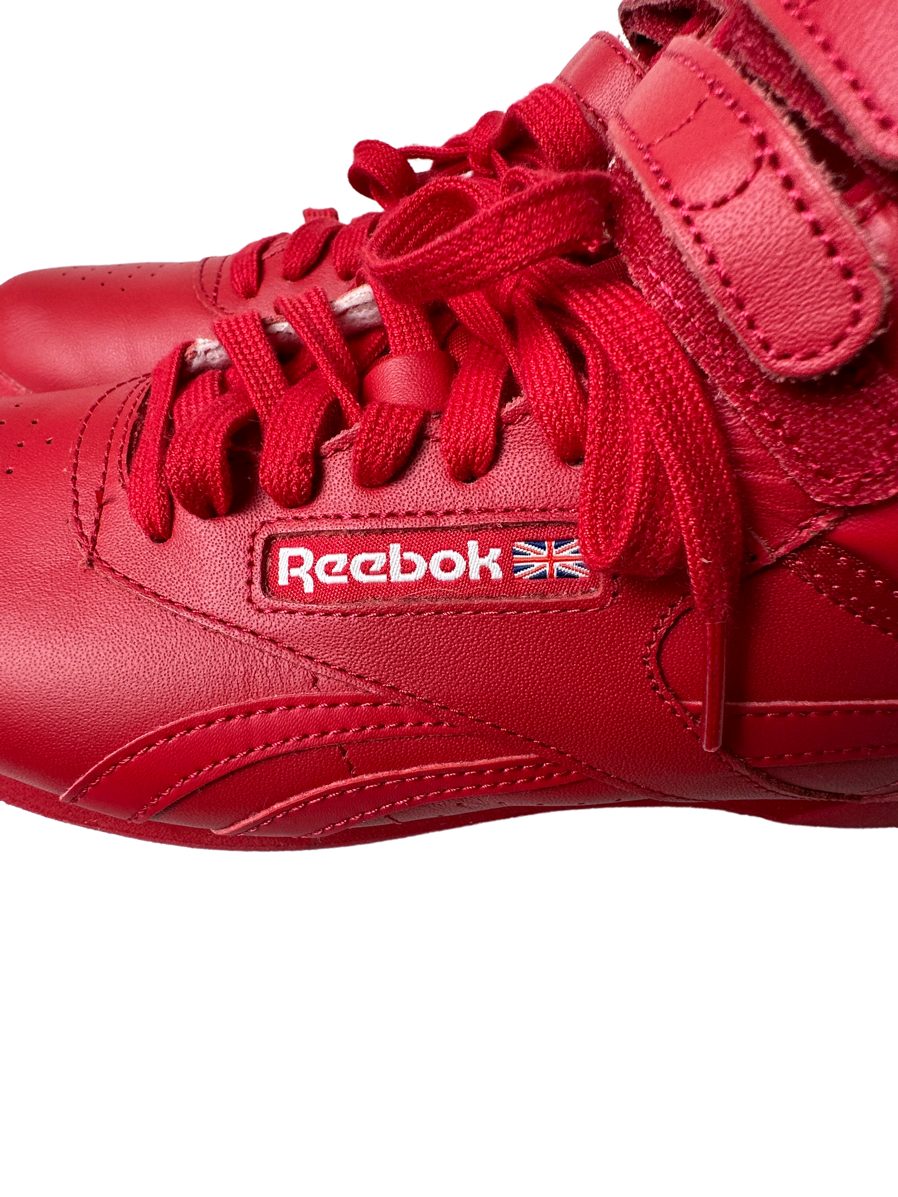 Reebok Women’s Freestyle Hi M43399 Red Leather Shoes Sneakers Size 7.5 Add some fiery fun to your shoe collection with these red hi-top sneakers. With a retro design