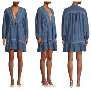 Free People Rugged Beauty Swing Dress Size XL Unleash your inner free spirit with the Free People Rugged Beauty Swing Dress. This flowy dress features a deep V-neck 