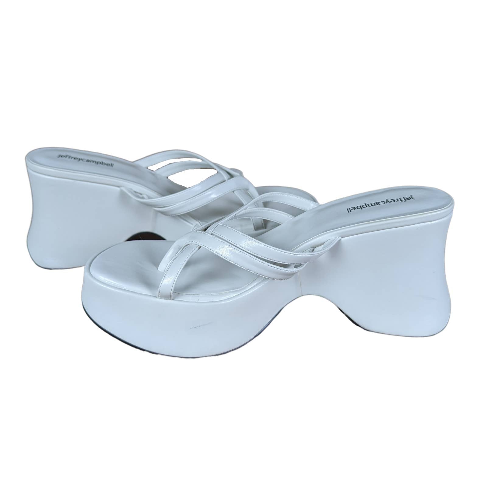 Jeffrey CampbellSuper cute for summer! Jeffrey Campbell White strappy sandals. New without box! Wrapped leather platform. Brand new condition.Jeffrey Campbell White Platform SandalsJeffrey Campbell White Platform Sandals