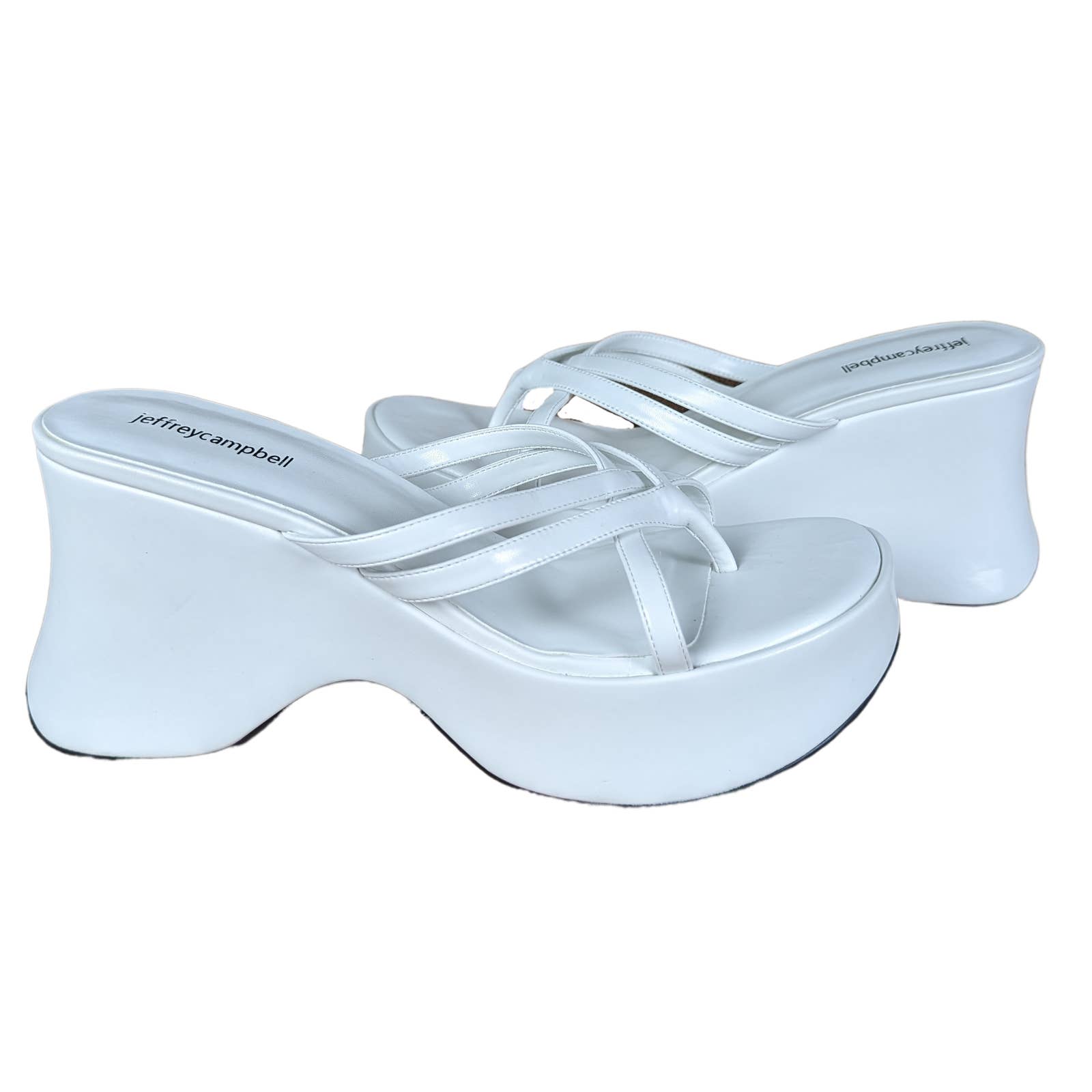 Jeffrey CampbellSuper cute for summer! Jeffrey Campbell White strappy sandals. New without box! Wrapped leather platform. Brand new condition.Jeffrey Campbell White Platform SandalsJeffrey Campbell White Platform Sandals