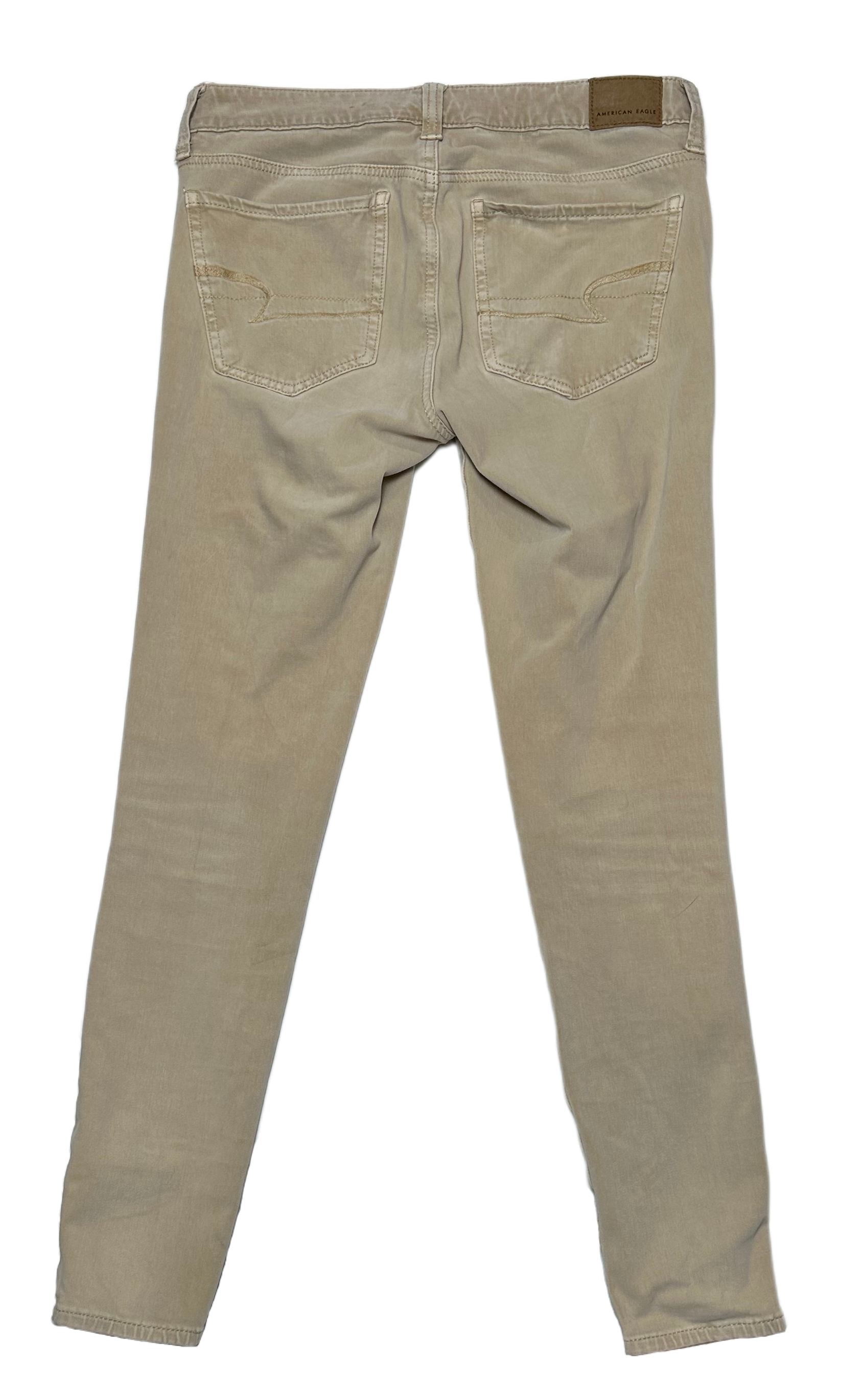 American Eagle Introducing American Eagle Tan Jeggings - the ultimate elevated basic! With a classic tan shade and classic jean pocket flair, these jeggings are made for slaying.PantsAmerican Eagle Tan JeggingsAmerican Eagle Tan Jeggings