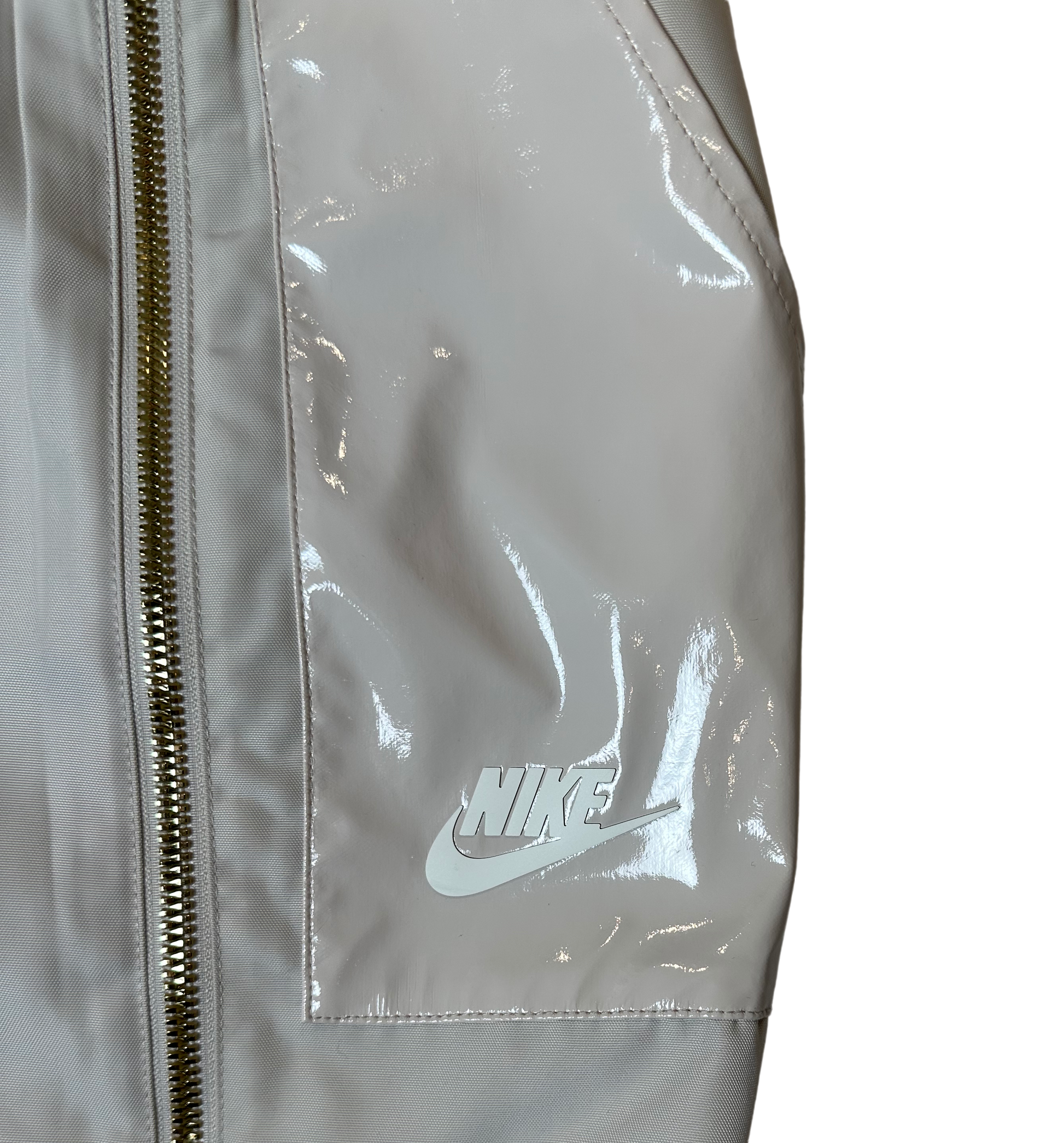Nike Women's Nude Zip Front Cargo Joggers  Patent Leather Details sze M Effortless style meets functional cool with these cargo joggers that refuse to take themselv