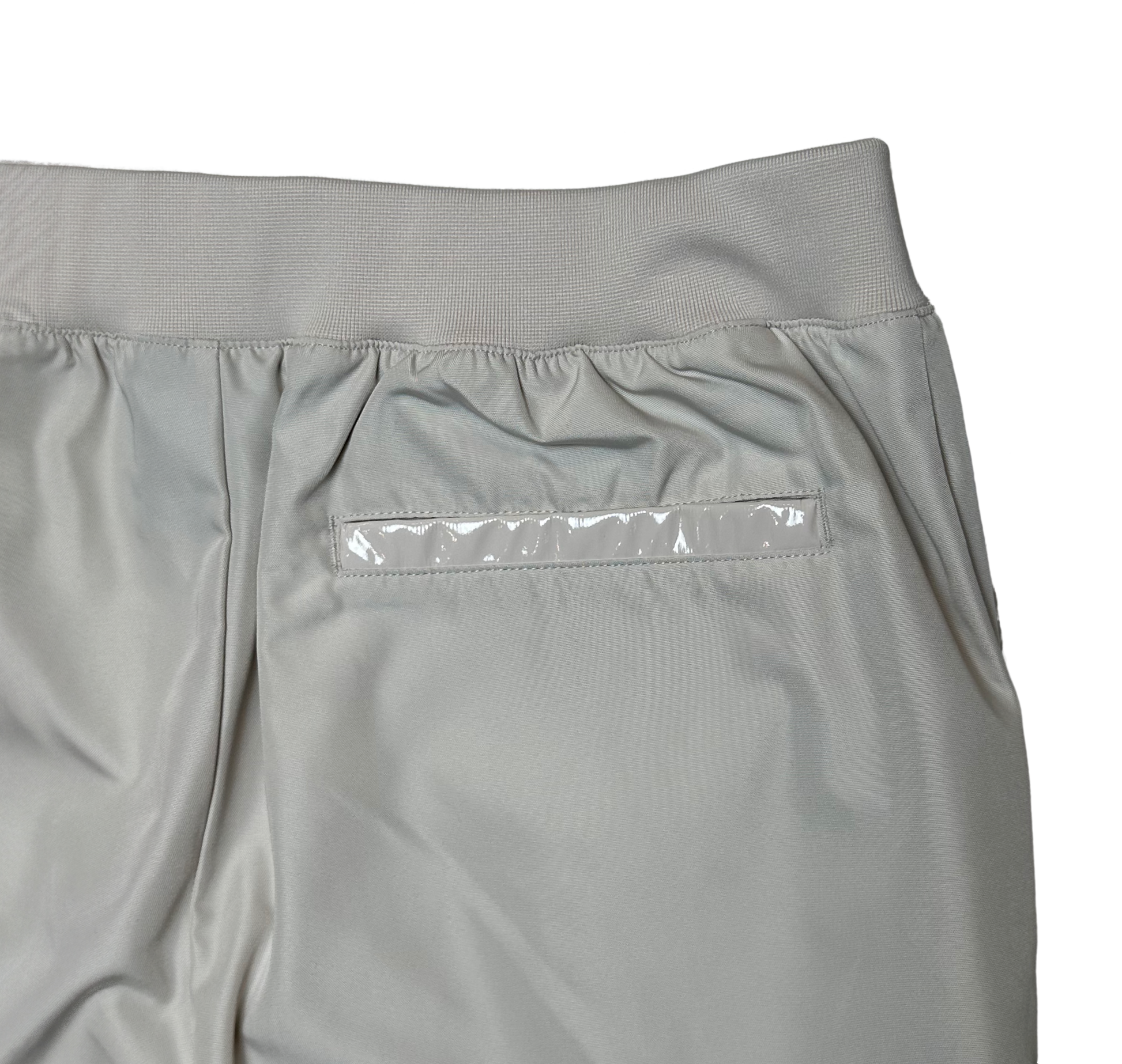 Nike Women's Nude Zip Front Cargo Joggers  Patent Leather Details sze M Effortless style meets functional cool with these cargo joggers that refuse to take themselv